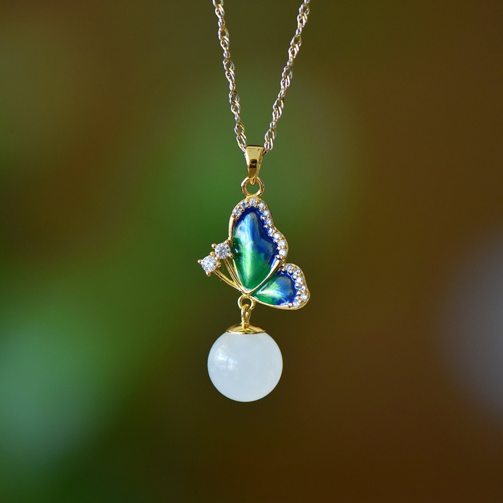 An Exquisite Sterling Silver-Gold Plated Inlaid White Jade Enamel Pendant