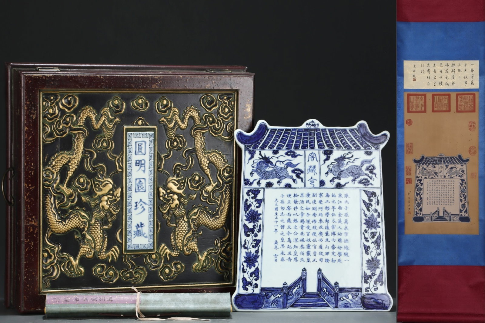 A Huge Blue and White Auspicious Cloud and Kylin Pattern Ornament,with poem,with Chinese Vertical: A Huge Blue and White Auspicious Cloud and Kylin Pattern Ornament,with poem,with Chinese Vertical Scroll Ink Painting on Silk,Yuan Dynasty,China,Size:(Silk)24inx12.6in,(Porcelain)16.3inx13.8in 青
