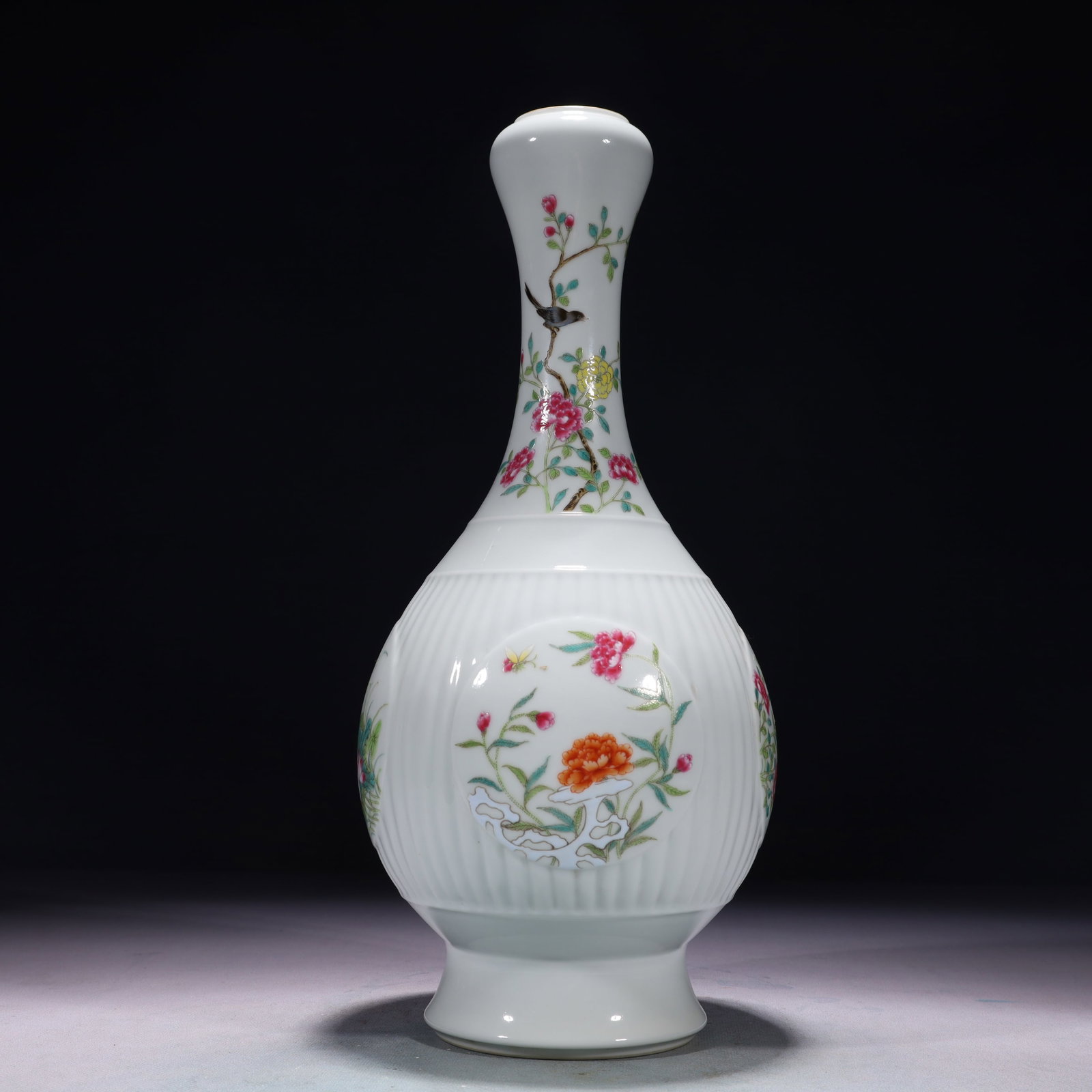 An Exquisite Famille-Rose Painted Gold Flower and Butterfly Pattern Vase: An Exquisite Famille-Rose Painted Gold Flower and Butterfly Pattern Vase,Qing Dynasty,China,Qianlong Six-character Mark,Size:5.5inx13.8in,Weight:1500g 粉彩描金花卉&