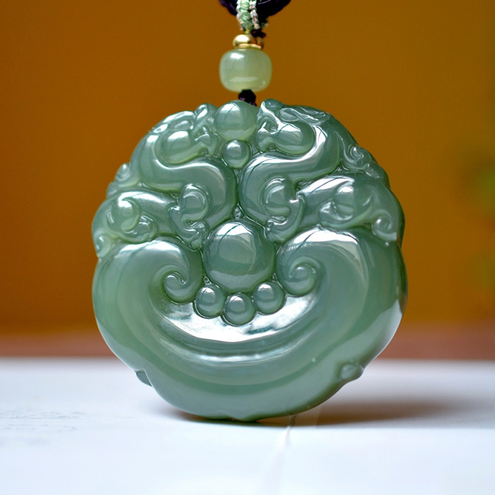 An Exquisite Greenish Jade Dragon Pattern Pendant (1 of 4)