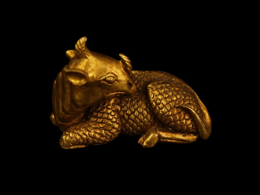 An Exquisite Gilt Bronze Rhinoceros Ornament: An Exquisite Gilt Bronze Rhinoceros Ornament,Qing Dynasty,China,Size:3.1inx1.6inx2in,Weight:335g,铜鎏金犀牛摆件,中国清代