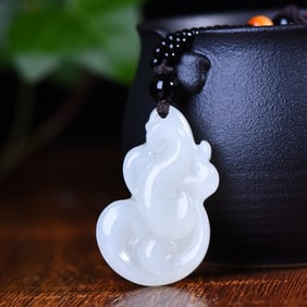 An Exquisite White Jade Phoenix Pendant