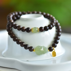 An Exquisite Greenish Jade Eaglewood Bracelets