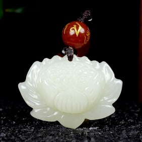 An Exquisite White Jade Lotus Pendant