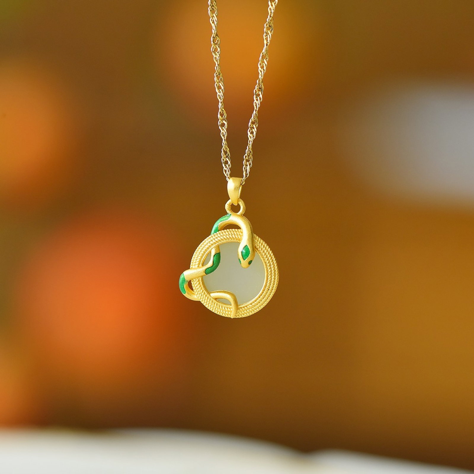 An Exquisite Sterling Silver-Gold Plated Inlaid White Jade Pendant: An Exquisite Sterling Silver-Gold Plated Inlaid White Jade Pendant,Size:10mmx10mm 纯银镀金镶白玉吊坠