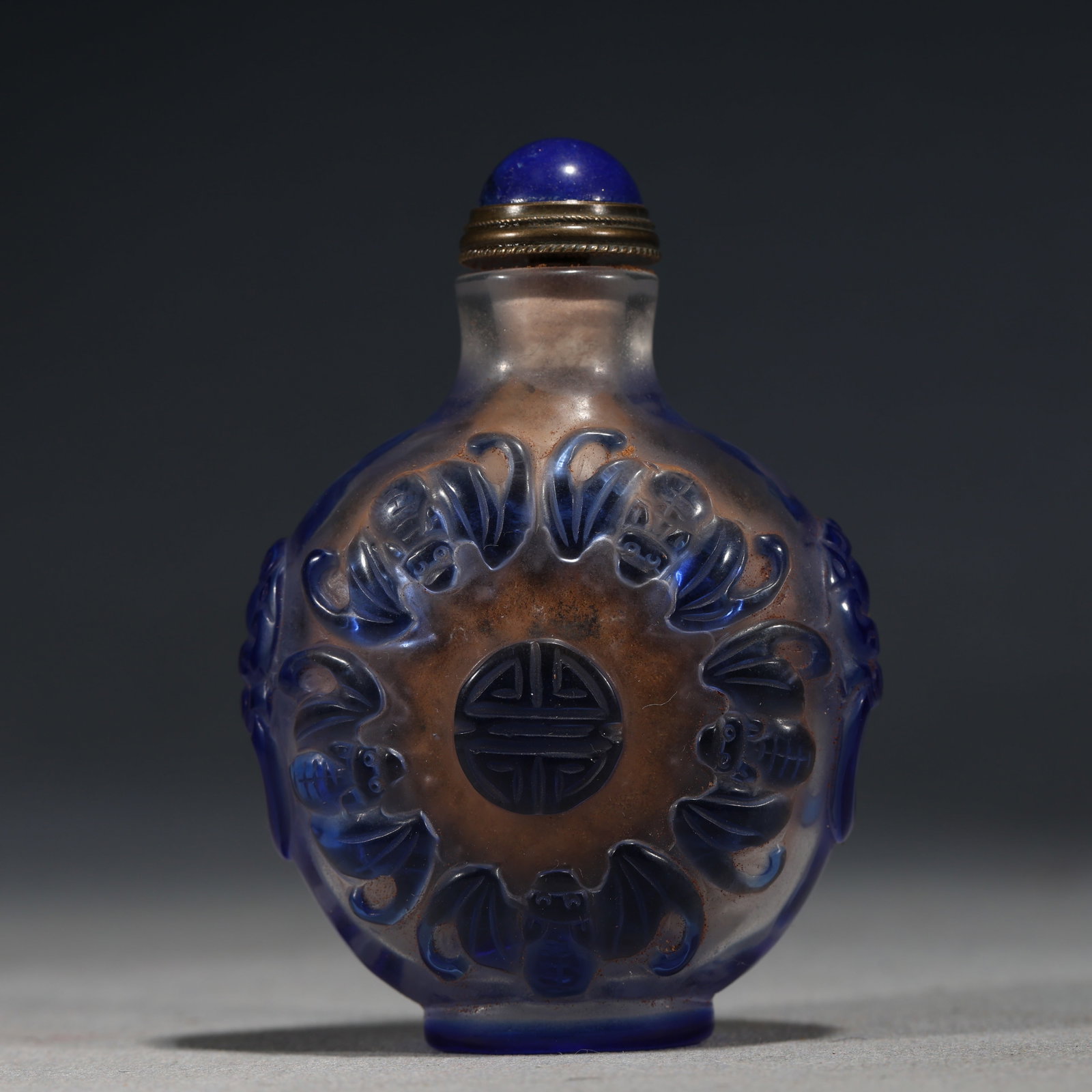 An Exquisite Overlaid Blue Glass Snuff Bottle With Fortune And Longevity Pattern: An Exquisite Overlaid Blue Glass Snuff Bottle With Fortune And Longevity Pattern,China,Qing Dynasty,Four-Character Qianlong Mark,Dimensions:3inx2in,套蓝琉璃福寿 