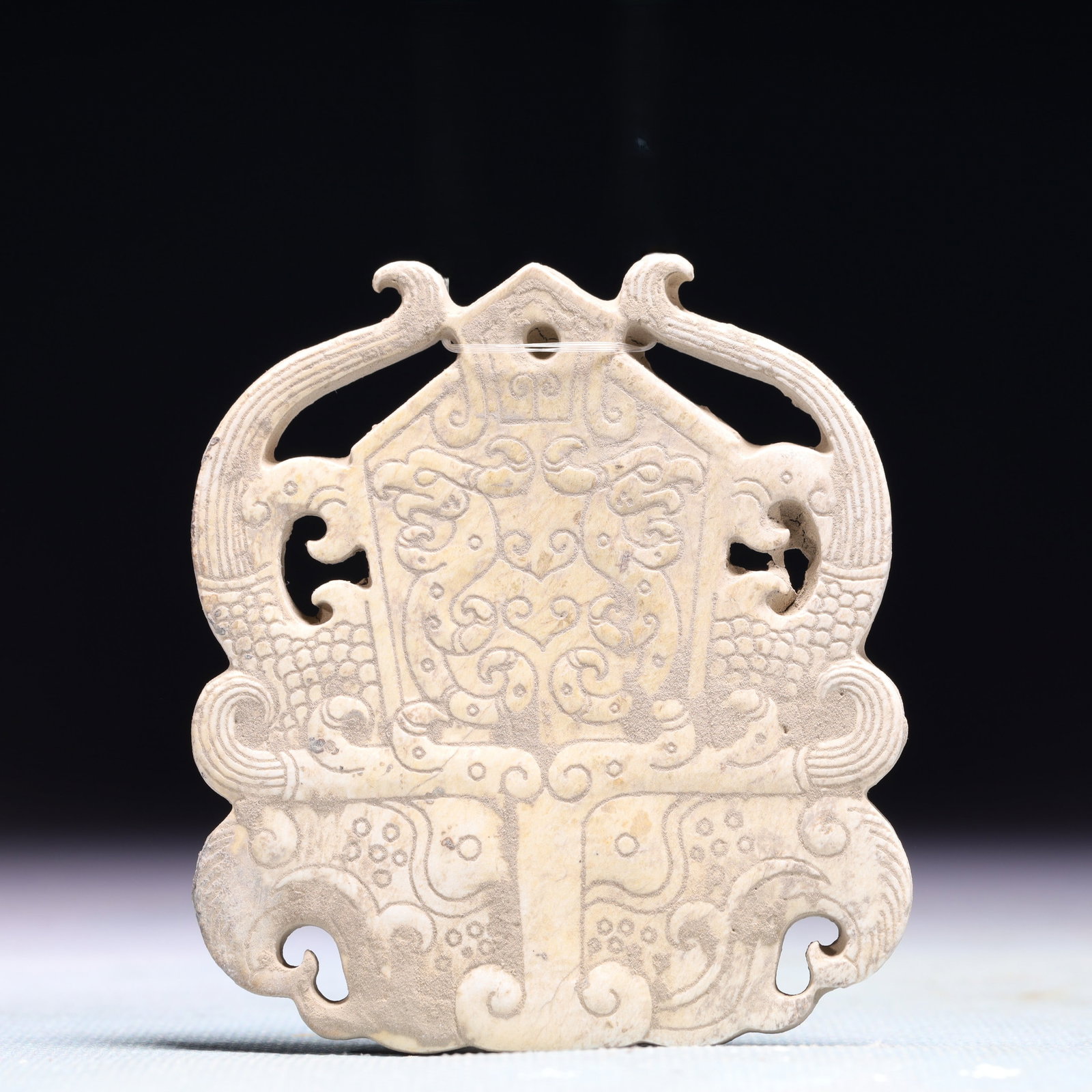 An Exquisite Archaic Jade Beast-Face Pattern Pendant: An Exquisite Archaic Jade Beast-Face Pattern Pendant,Ancient Time,China,Size:2.8inx3in,Weight:64.9g 高古玉兽面纹挂件,中国远古