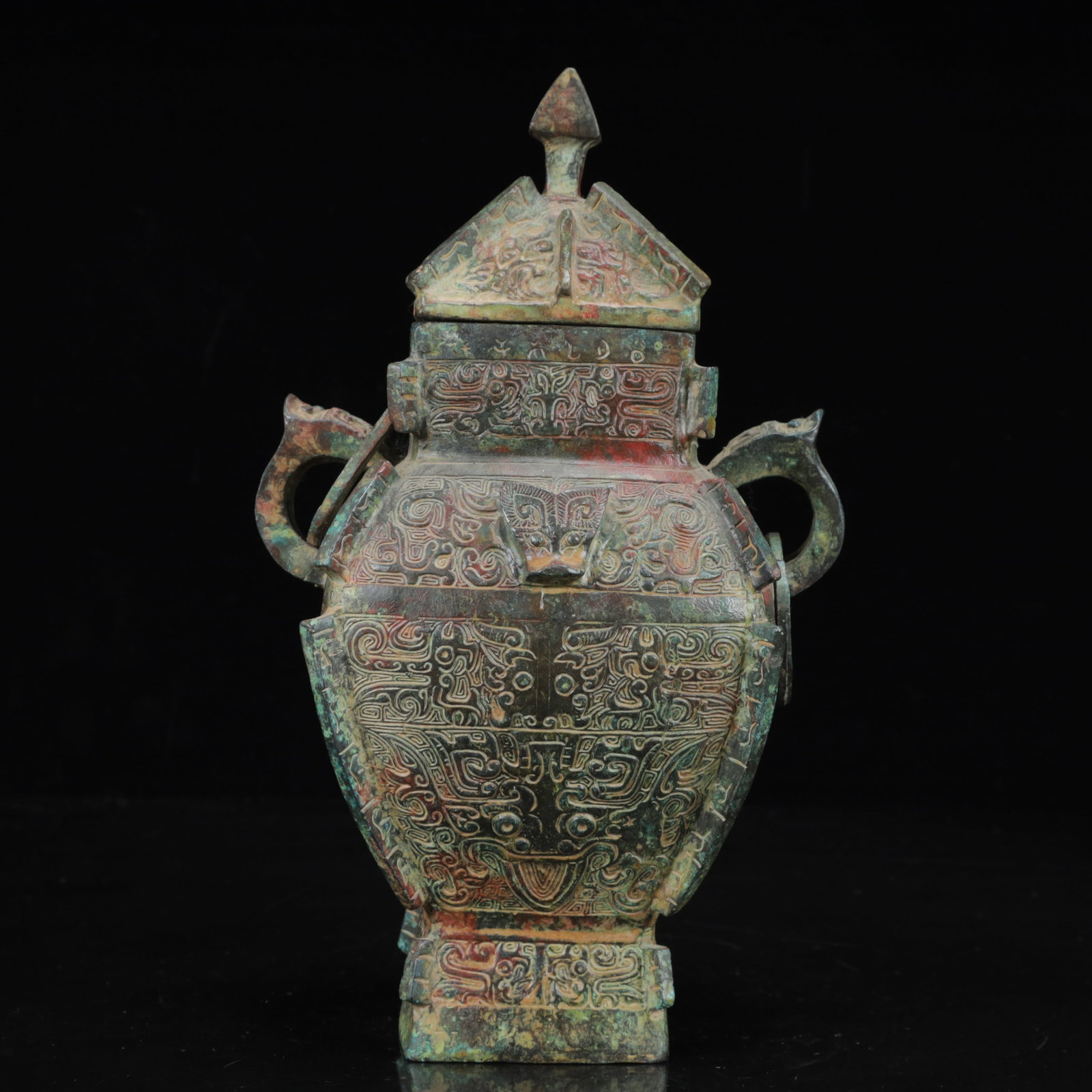 An Archaic Bronze Beast-Face Pattern Beast-Ears Vase: An Archaic Bronze Beast-Face Pattern Beast-Ears Vase,the Warring States Period in China,Size:6.3inx4.3inx9.8in,Weight:1800g 青铜兽面纹兽耳瓶,中
