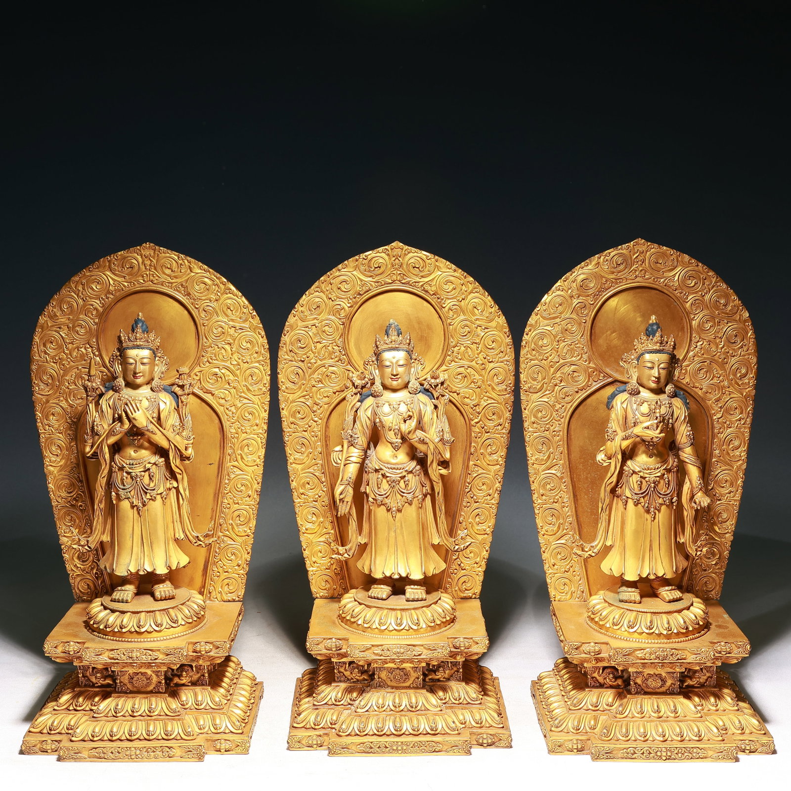 A Set of Solemn Gilt Bronze Buddha Statue: A Set of Solemn Gilt Bronze Buddha Statue,Ming Dynasty, China,Yongle Six-character Mark,Size:7.9inx5.9inx17.7in,Weight:24050g 一套铜鎏金佛像,中国&