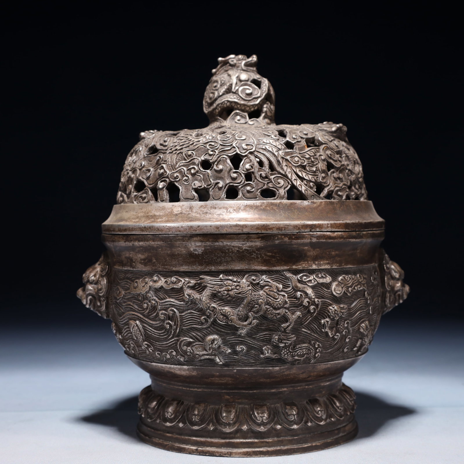 An Exquisite Silver-plated Bronze Seawater and Dragon Pattern Beast-Ears Censer: An Exquisite Silver-plated Bronze Seawater and Dragon Pattern Beast-Ears Censer,Ming Dynasty,China,Xuande Six-character Mark,Size:7.5inx6.3inx8.7in,Weight:2300g 铜镀银海水