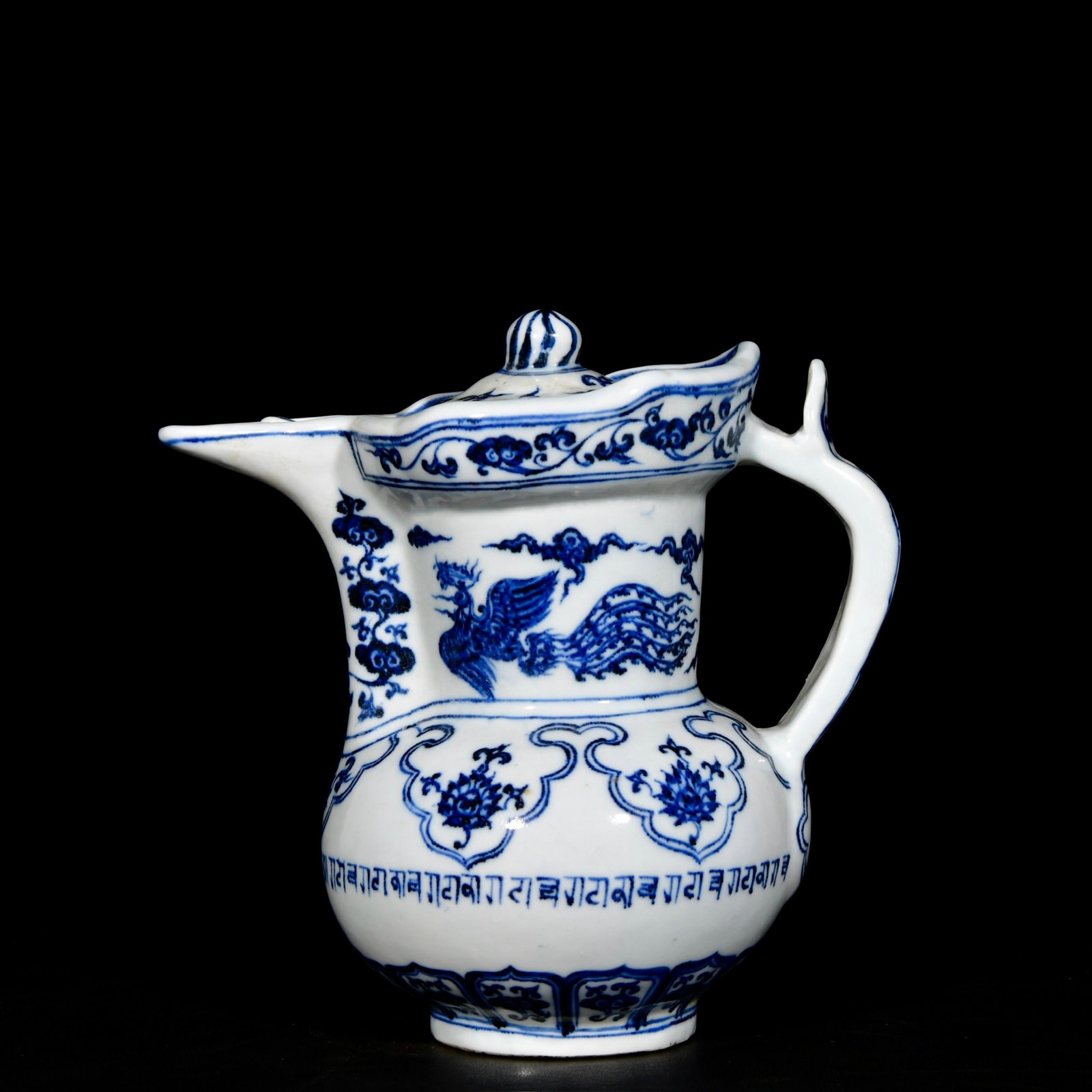An Exquisite Blue and White Auspicious Cloud and Phoenix Pattern Ewer,With Sanskrit: An Exquisite Blue and White Auspicious Cloud and Phoenix Pattern Ewer,With Sanskrit,Ming Dynasty, China,Xuande Six-character Mark,Size:9.1inx8.7in 青花祥云凤纹û