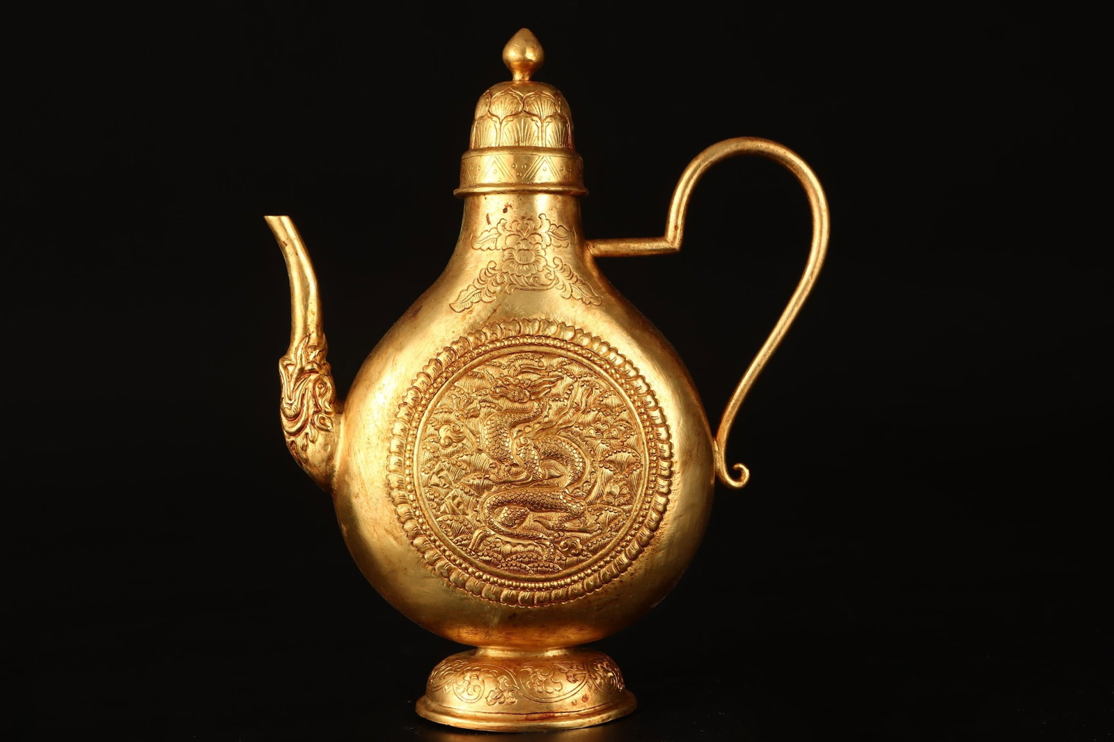 An Exquisite Gilt Bronze Auspicious Cloud and Dragon Pattern Ewer: An Exquisite Gilt Bronze Auspicious Cloud and Dragon Pattern Ewer,Qing Dynasty,China,Qianlong Four-character Mark,Size:8.3inx6.3in,Weight:491g 铜鎏金祥云龙纹&