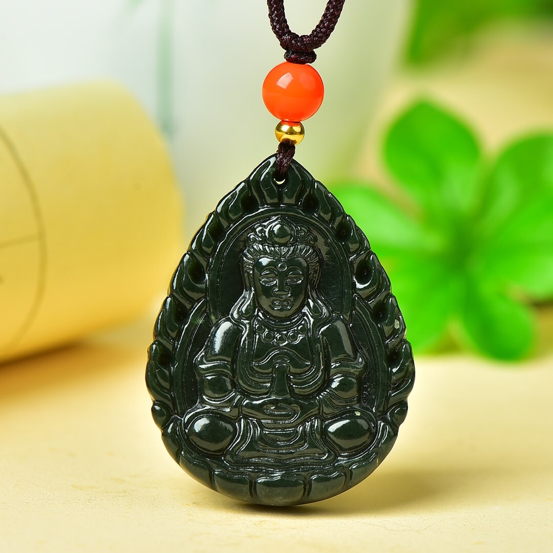 An Exquisite Sapphire Avalokitesvara Pattern Pendant: An Exquisite Sapphire Avalokitesvara Pattern Pendant,Size:33mmx45mm 寓意:寓意吉祥 玉脂温润 青玉观音像纹&