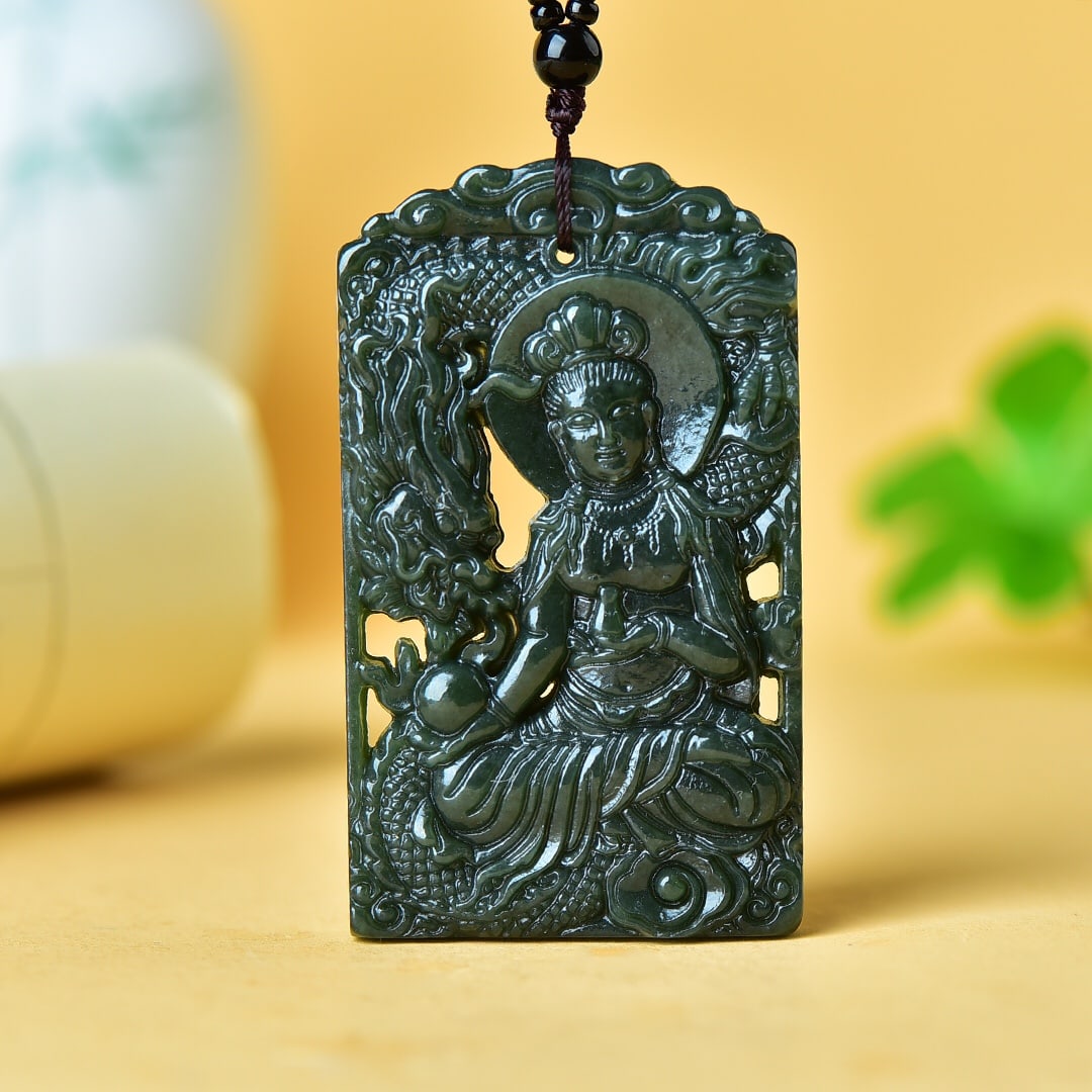 An Exquisite Sapphire Hollow Avalokitesvara and Dragon Pattern Pendant: An Exquisite Sapphire Hollow Avalokitesvara and Dragon Pattern Pendant,Size:68mmx40mm 寓意:寓意吉祥 玉脂温润 青玉镂空