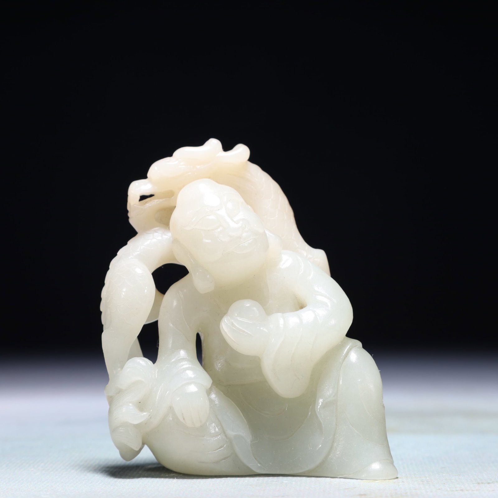 An Exquisite White Jade Figure Ornament: An Exquisite White Jade Figure Ornament,Qing Dynasty,China,Size:2.8inx1.2inx3.1in,Weight:224.2g 白玉人物摆件,中国清代
