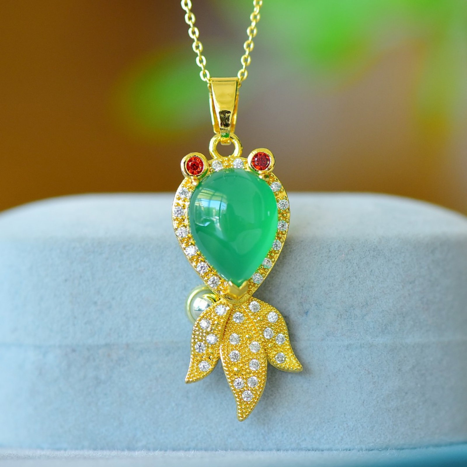 An Exquisite Goldfish Pendant,Inlaid Diamond: An Exquisite Goldfish Pendant Size:10mmx12mm 金鱼吊坠