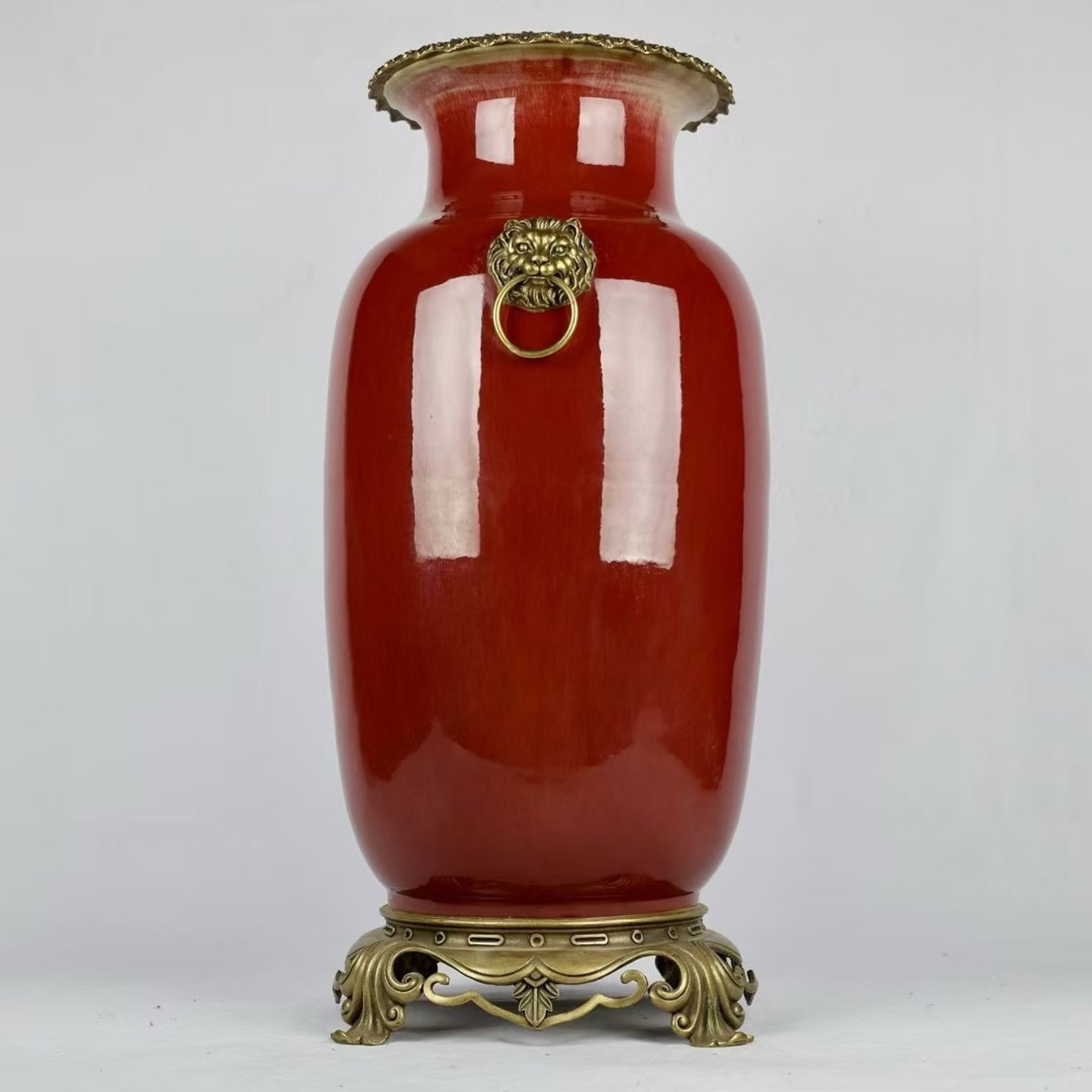 A Huge Red Glazed Inlaid Bronze Lion-Ears Vase: A Huge Red Glazed Inlaid Bronze Lion-Ears Vase,Qing Dynasty,China,Qianlong Six-character Mark,Size:24.4inx11.8in 红釉镶铜狮耳瓶,中国清ߣ