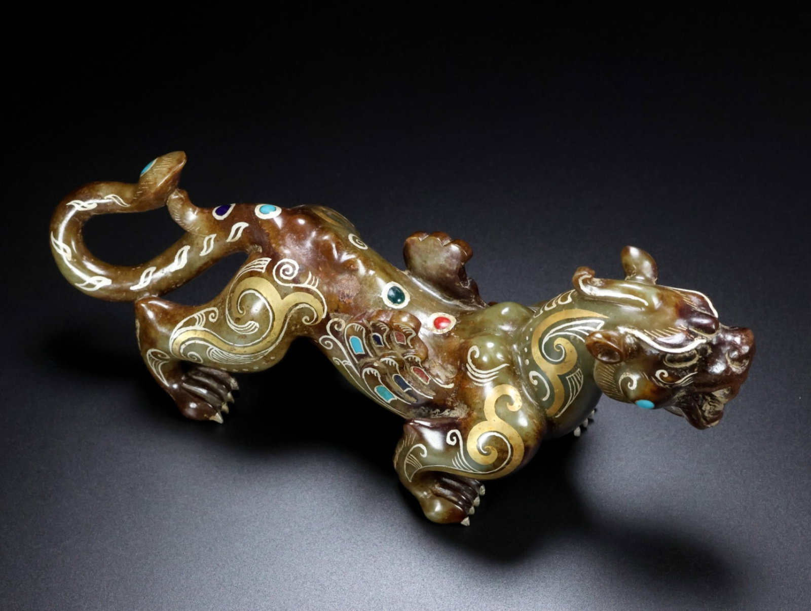 An Archaic Gaogu yu Auspicious Beast Ornament: An Archaic Gaogu yu Auspicious Beast Ornament,Ancient Time, China, Size:10.2inx3.1inx4.3in, Weight:1075g 高古玉瑞兽摆件,中国远古ਲ
