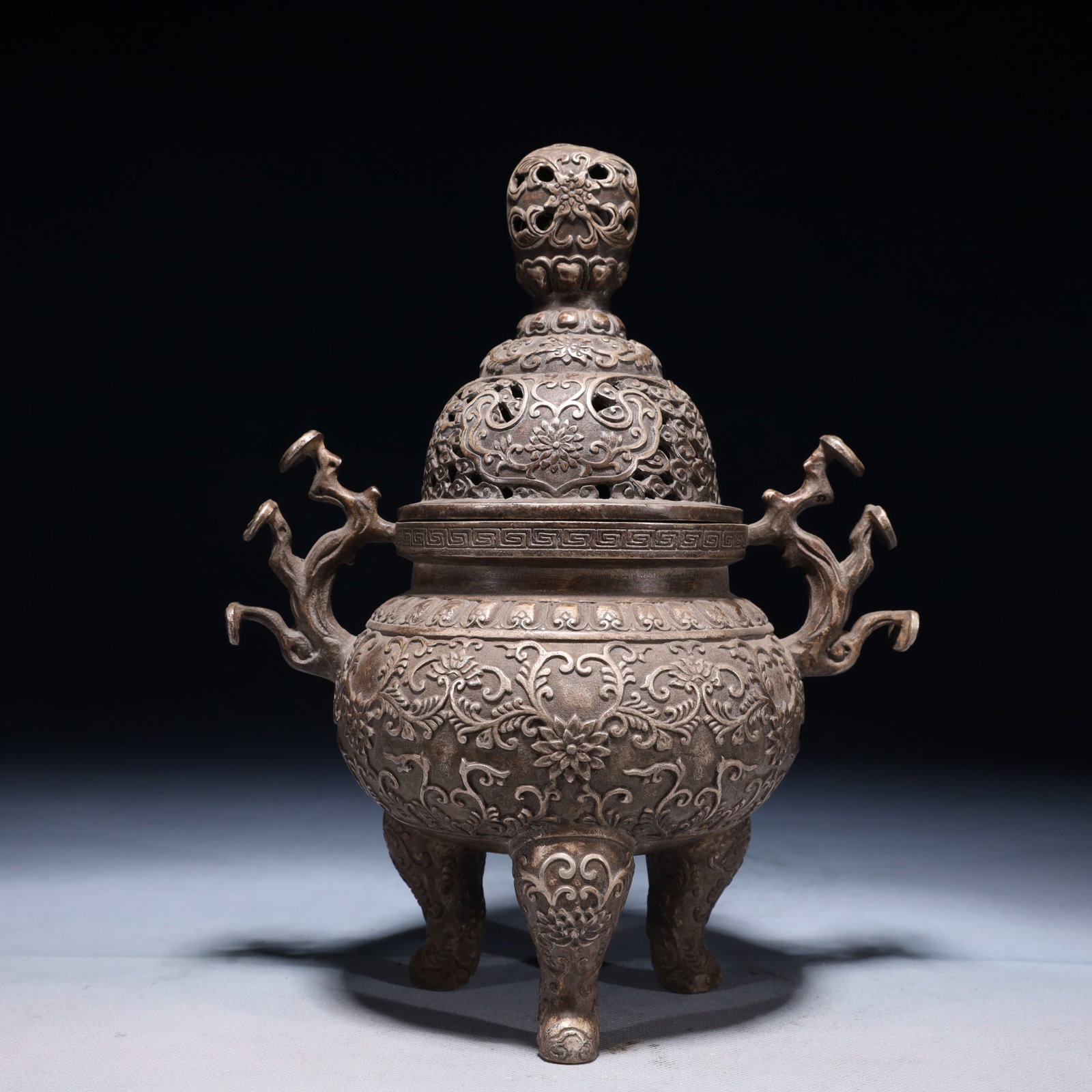An Exquisite Silver-plated Bronze Lotus Pattern Double-Ears and Tripod Censer: An Exquisite Silver-plated Bronze Lotus Pattern Double-Ears and Tripod Censer,Qing Dynasty,China,Qianlong Four-character Mark,Size:8.3inx5.5inx6.3in,Weight:1700g 铜镀银缠ੜ