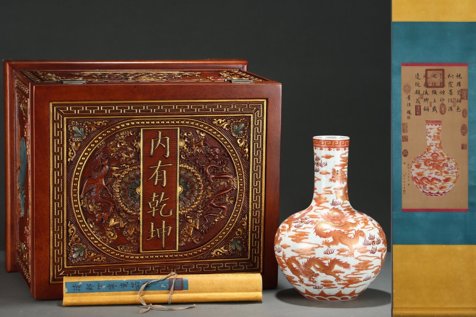 A Rare Iron-Red Auspicious Cloud and Dragon Pattern Vase,with Chinese Vertical Scroll Ink Painting: A Rare Iron-Red Auspicious Cloud and Dragon Pattern Vase,with Chinese Vertical Scroll Ink Painting on Silk,Qing Dynasty,China,Yongzheng Six-character Mark,Size:(Silk)23.6inx11in,(Porcelain)11.9inx8.4i