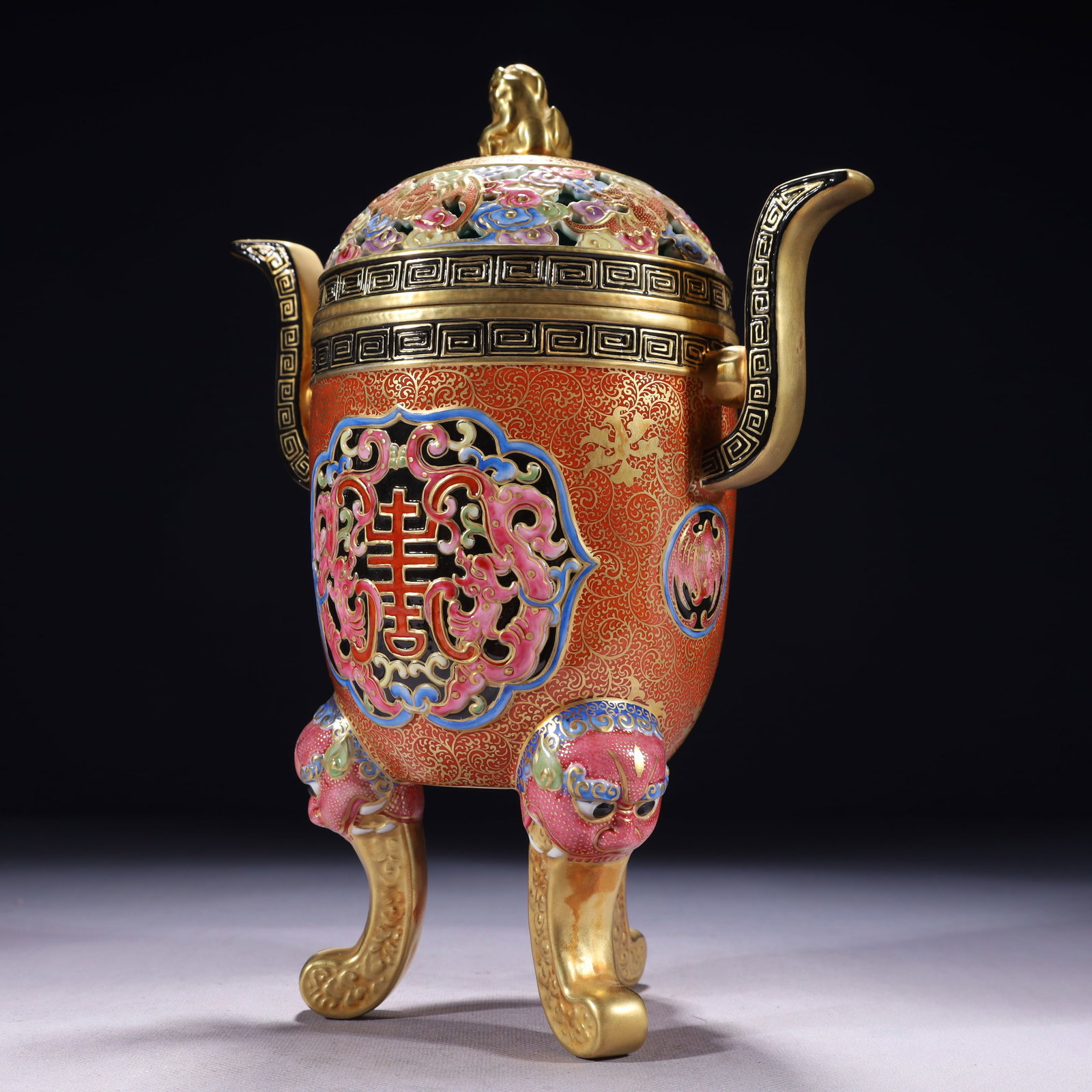 An Exquisite Red Glazed Painted Gold Dragon Pattern Double-Ears and Tripod Censer: An Exquisite Red Glazed Painted Gold Dragon Pattern Double-Ears and Tripod Censer,Qing Dynasty,China,Qianlong Six-character Mark,Size:8.7inx4.9inx11.8in,Weight:1350g 红釉描金&#