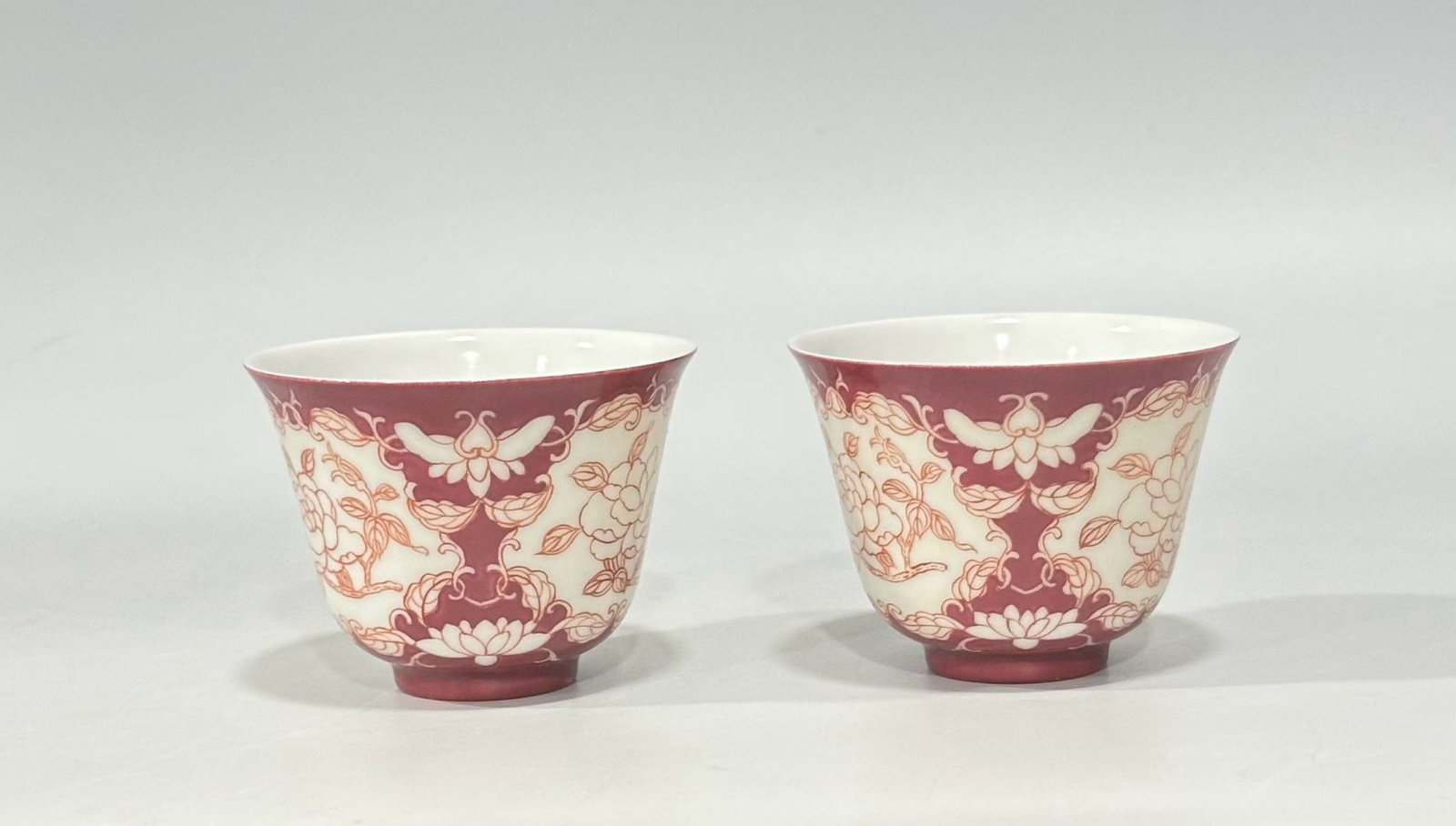 A Pair of Exquisite Ruby Red-Glazed Enamel Flower Pattern Cups: A Pair of Exquisite Ruby Red-Glazed Enamel Flower Pattern Cups,Qing Dynasty,China,Yongzheng Four-character Mark,Size:2.2inx2.8in 一对胭脂红珐琅彩花