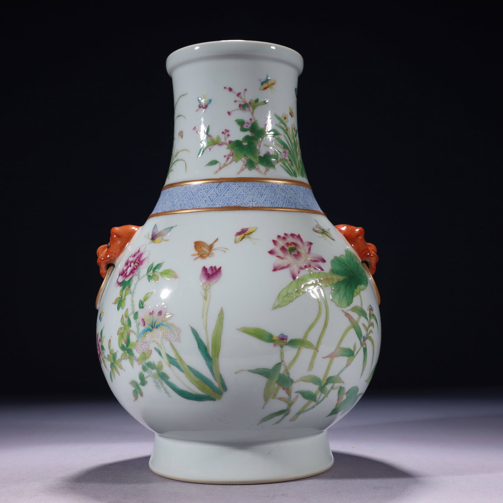 An Exquisite Famille-Rose Painted Gold Flower and Butterfly Pattern Beast-Ears Vase: An Exquisite Famille-Rose Painted Gold Flower and Butterfly Pattern Beast-Ears Vase,Qing Dynasty,China,Yongzheng Six-character Mark,Size:7.1inx11.8in,Weight:2400g 粉彩描金Ŏ