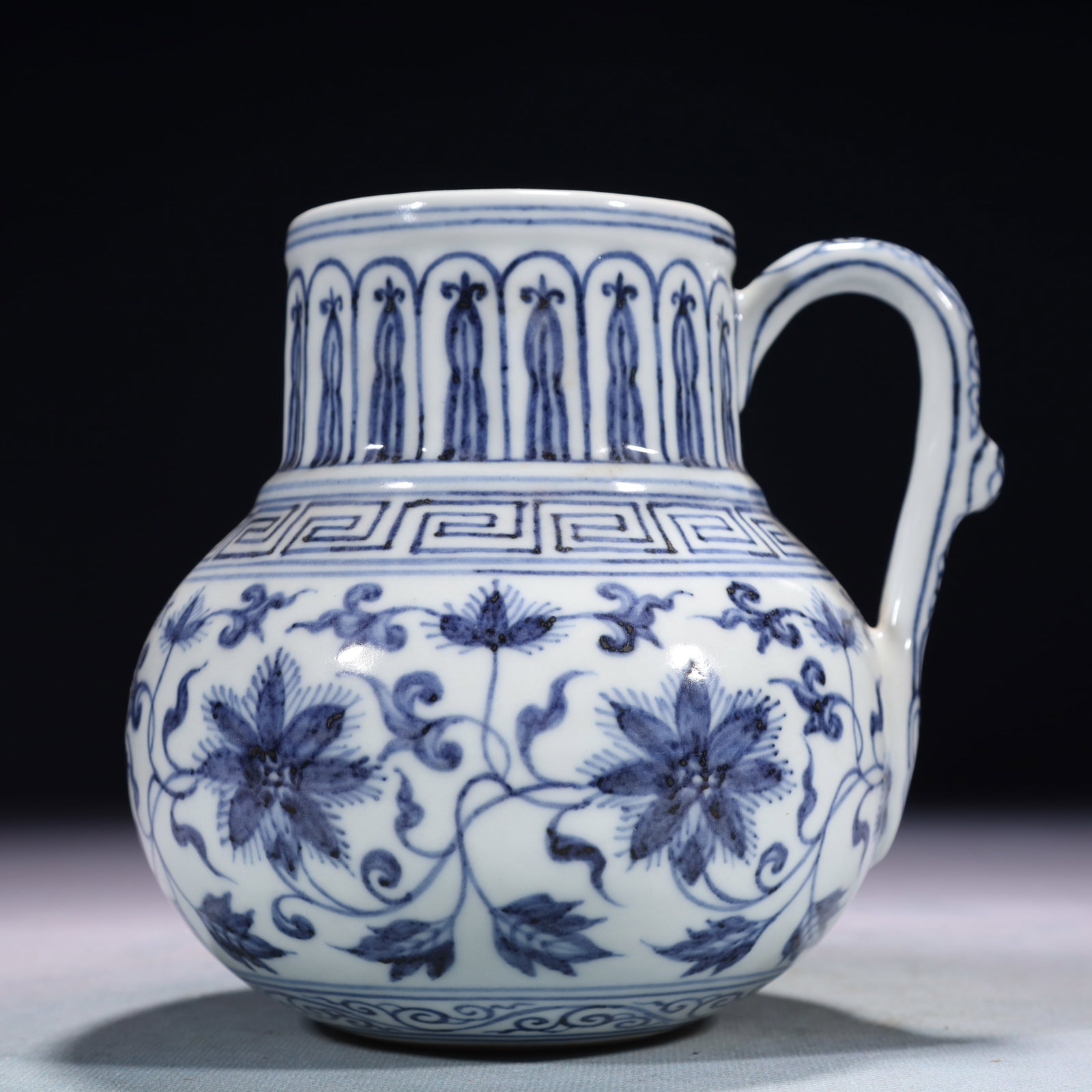 An Exquisite Blue and White Lotus Pattern Pot: An Exquisite Blue and White Lotus Pattern Pot,Ming Dynasty,China,Xuande Six-character Mark,Size:5.9inx4.7inx5.9in,Weight:800g 青花缠枝莲纹壶,中国&