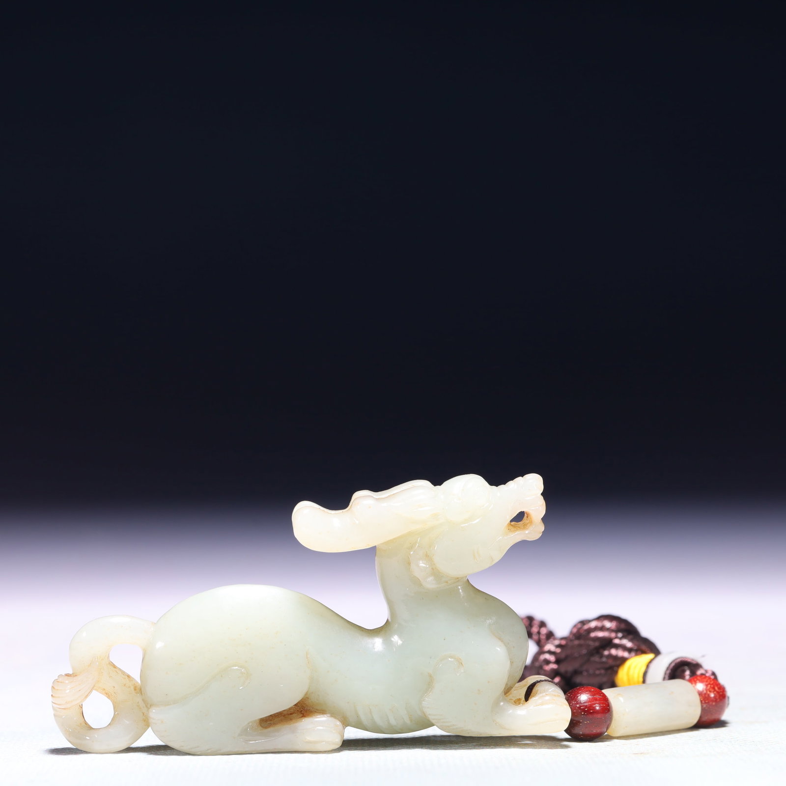 An Exquisite White Jade Deer Ornament: An Exquisite White Jade Deer Ornament,Qing Dynasty,China,Size:2.8inx0.6inx1.4in,Weight:57.3g 白玉鹿摆件,中国清代