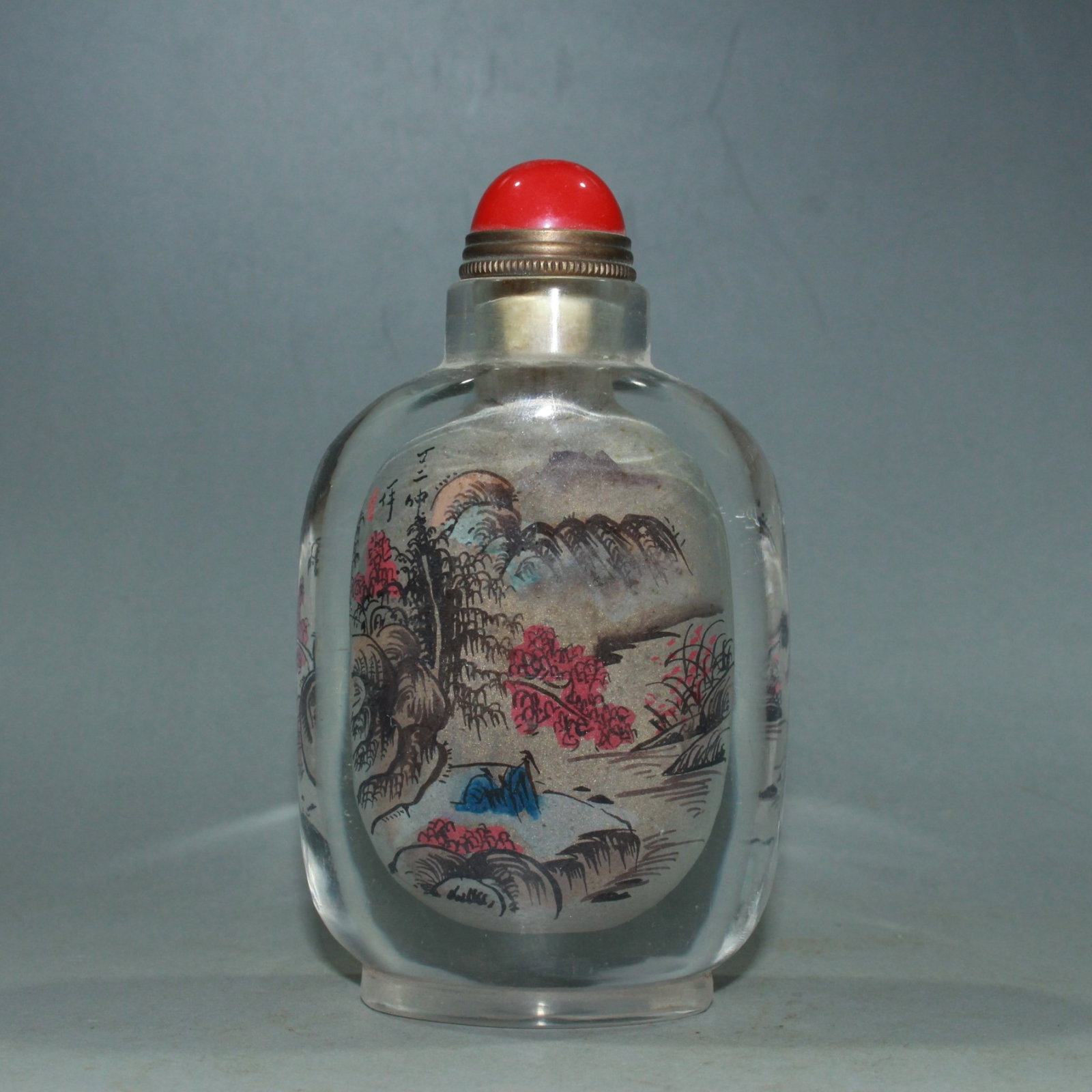 An Exquisite Glass Landscape Pattern Snuff Bottle: An Exquisite Glass Landscape Pattern Snuff Bottle,Qing Dynasty,China,Size:2.4inx1.2inx3.9in,Weight:177g
