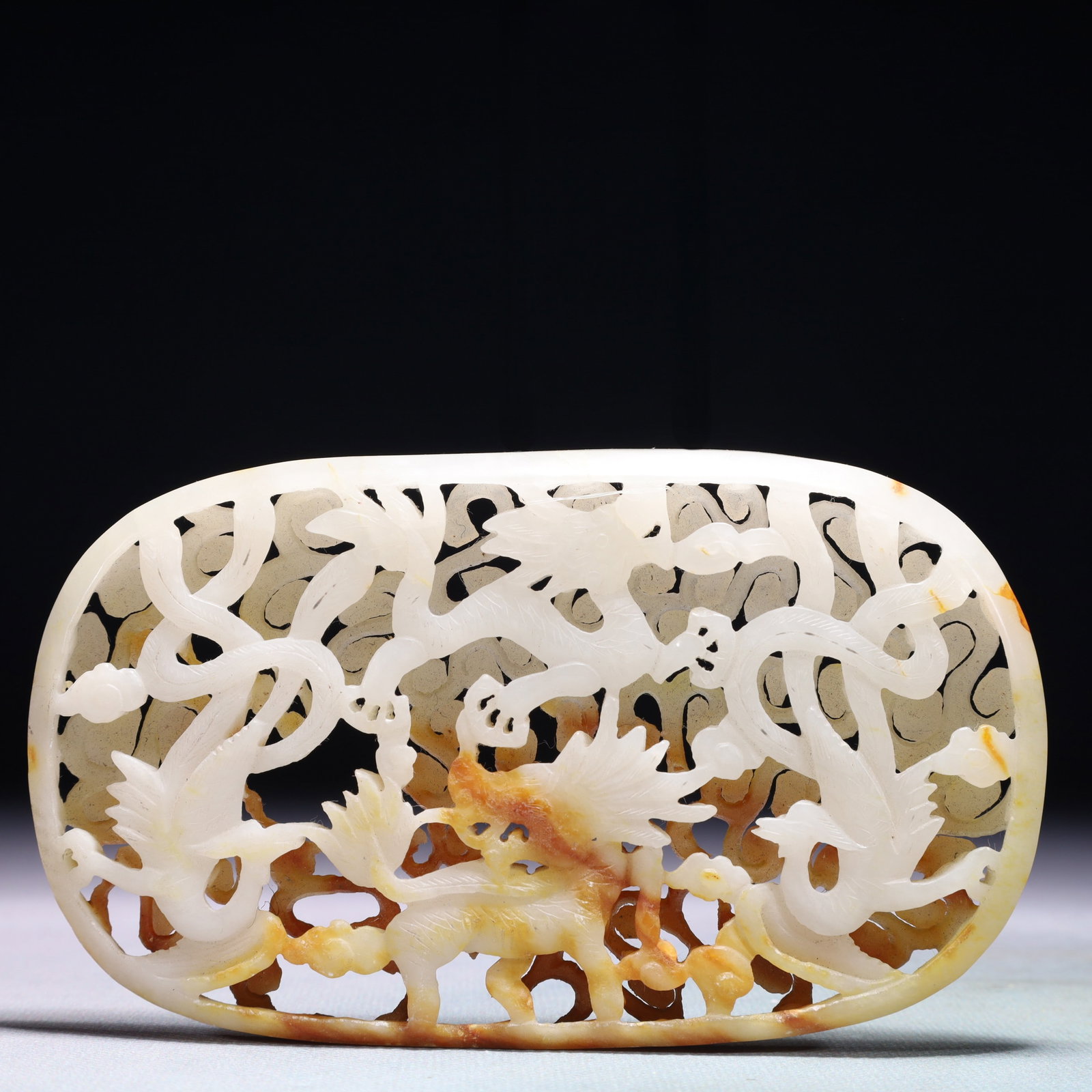 An Exquisite White Jade Auspicious Cloud and Phoenix Pattern Pendant: An Exquisite White Jade Auspicious Cloud and Phoenix Pattern Pendant,Qing Dynasty,China,Size:5.5inx3.1in,Weight:180.6g 白玉祥云凤纹佩,中国清