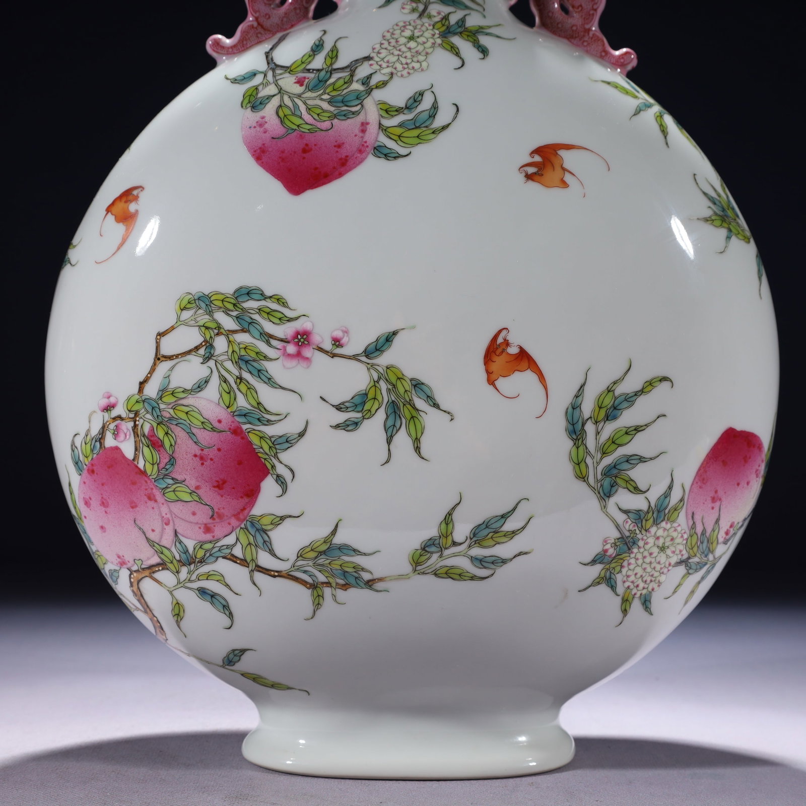 An Exquisite Famille-Rose Bats and Peach Pattern Double-Ears Vase: An Exquisite Famille-Rose Bats and Peach Pattern Double-Ears Vase,Qing Dynasty,China,Qianlong Six-character Mark,Size:9.8inx8.3inx13in,Weight:3100g