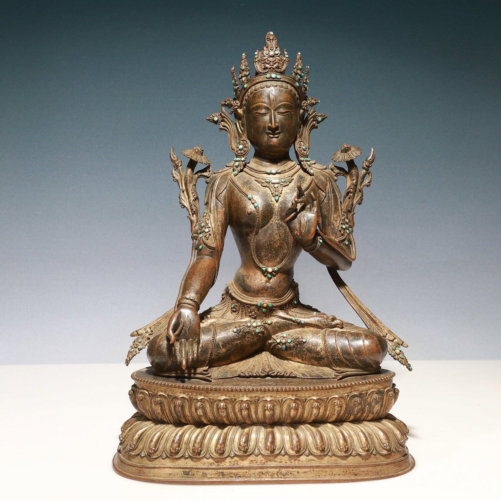 A Solemn Bronze Statue of Tara,With Inscription,Inlaid Turquoise: A Solemn Bronze Statue of Tara,With Inscription,Inlaid Turquoise,Qing Dynasty, China,Size:16.1inx9.8inx22.8in,Weight:16250g 铜度母像,带铭文,嵌绿&#