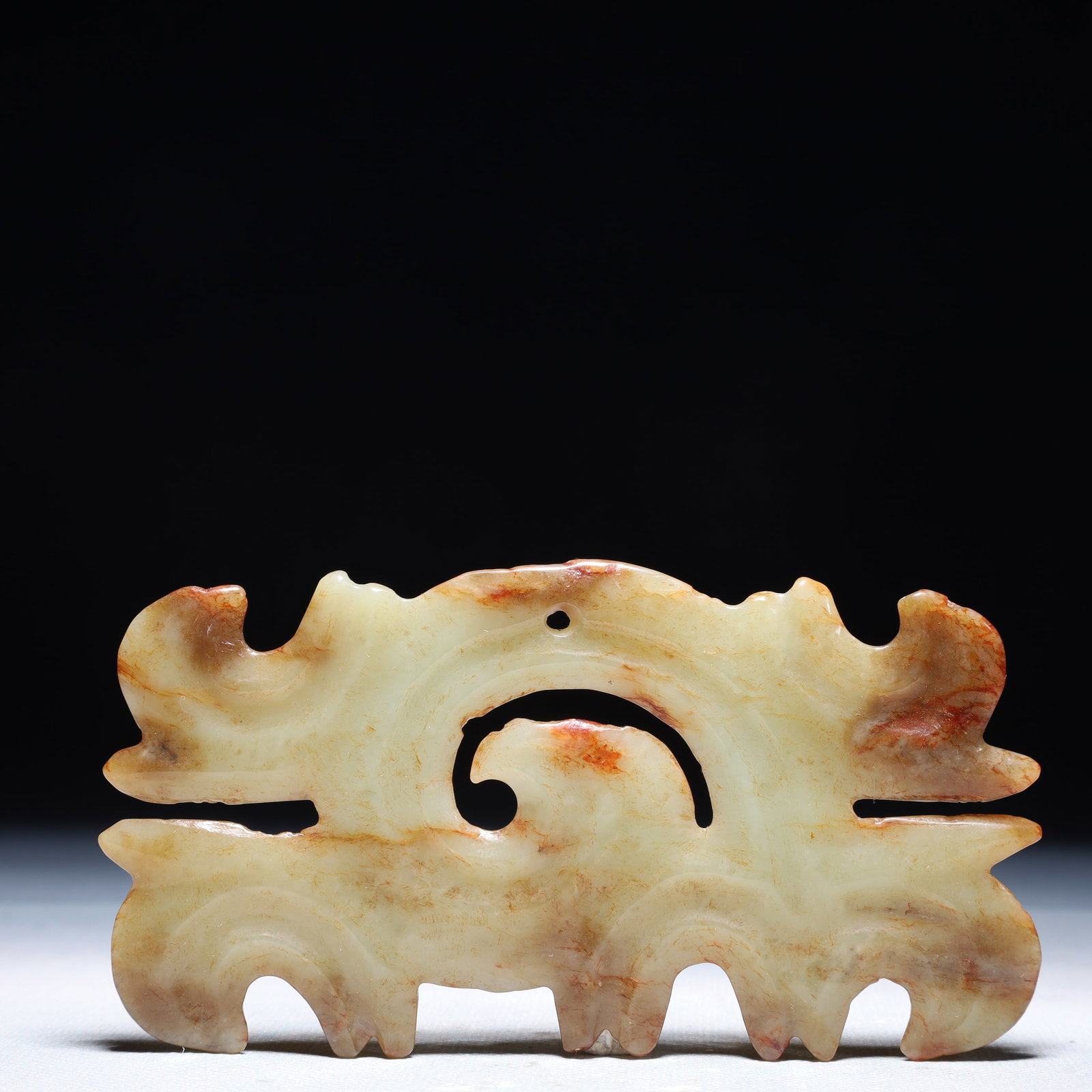 An Archaic Hongshan Culture White Jade Auspicious Cloud Pattern Pendant: An Archaic Hongshan Culture White Jade Auspicious Cloud Pattern Pendant,Ancient Time,China,Size:4.9inx2.6in,Weight:77.7g 红山文化白玉祥云纹挂
