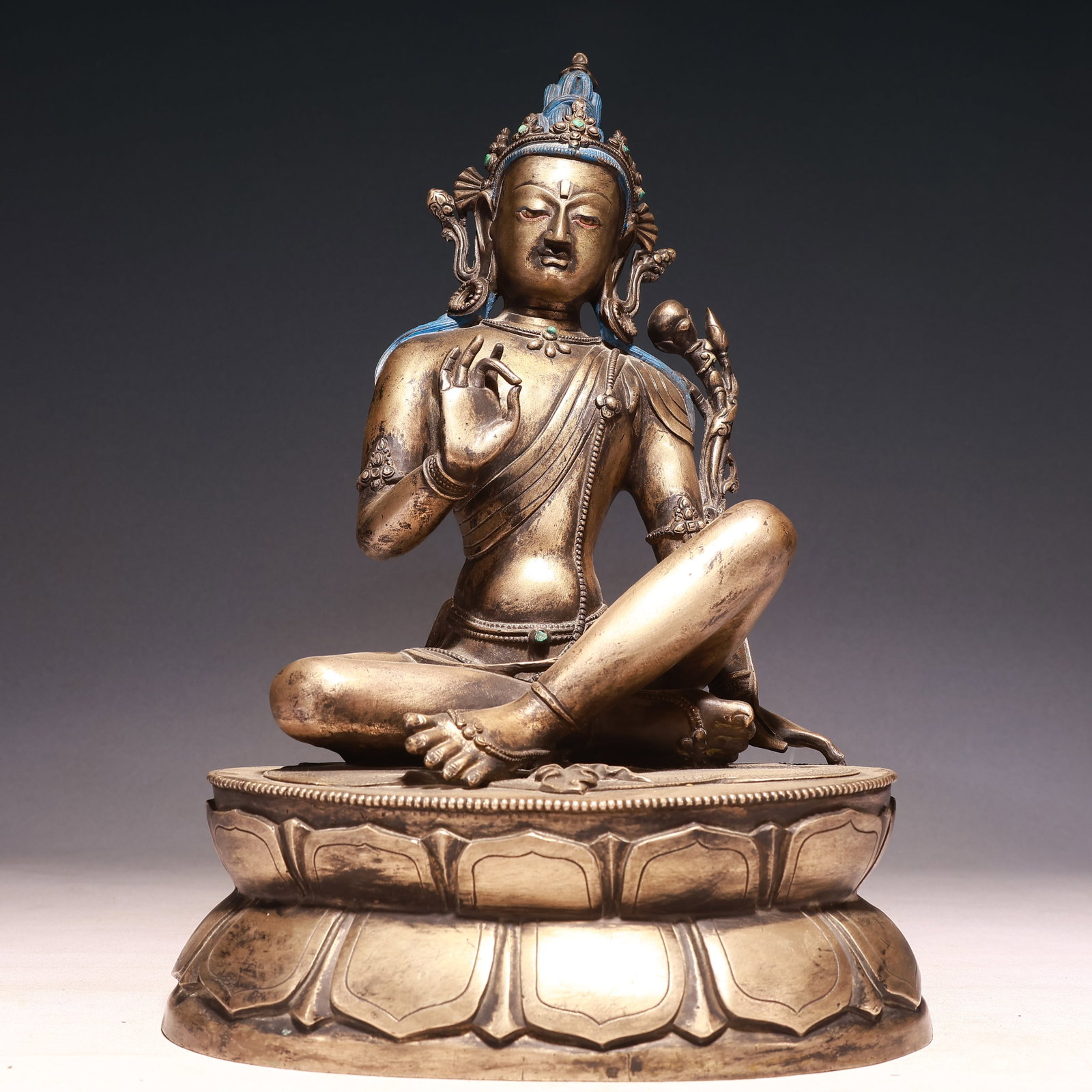 A Solemn Silver Buddha Statue (1 of 10)