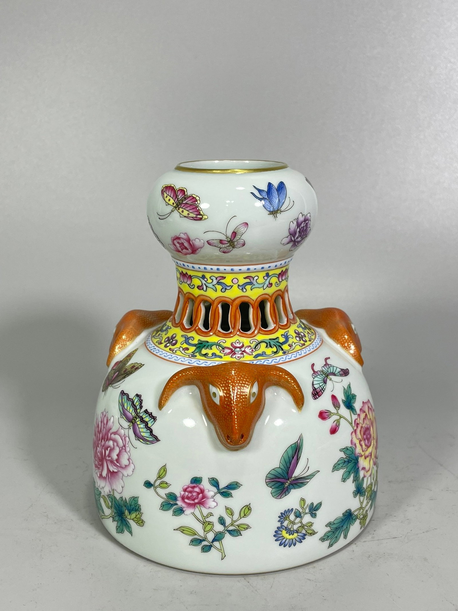 An Exquisite Famille-Rose Painted Gold Flower and Butterfly Pattern Sheep-Ears Vase: An Exquisite Famille-Rose Painted Gold Flower and Butterfly Pattern Sheep-Ears Vase,Qing Dynasty,China,Qianlong Six-character Mark,Size:5.7inx4.8in