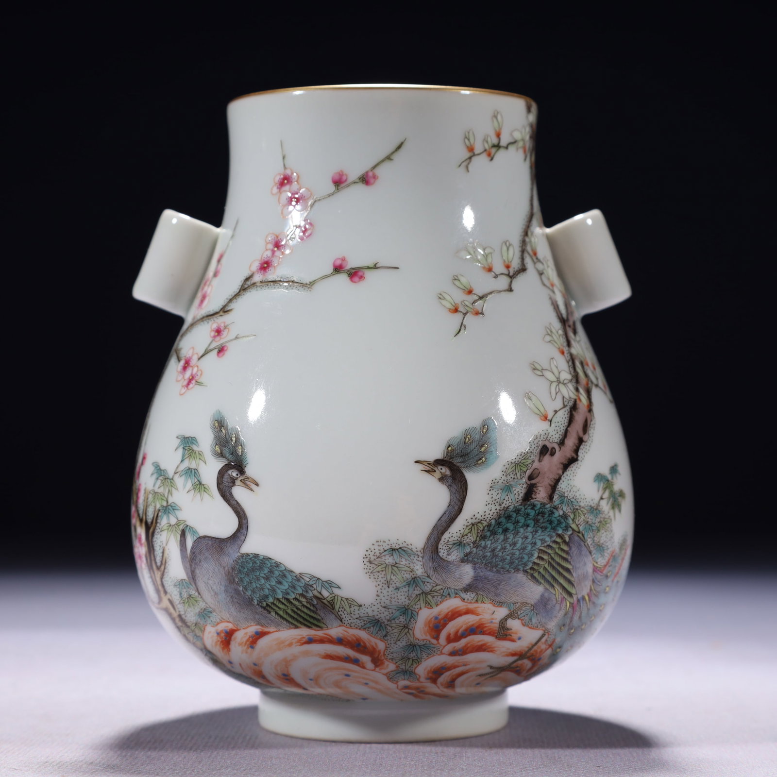 An Exquisite Famille-Rose Painted Gold Flower and Peacock Pattern Double-Ears Vase: An Exquisite Famille-Rose Painted Gold Flower and Peacock Pattern Double-Ears Vase,Qing Dynasty,China,Qianlong Six-character Mark,Size:3.9inx5.1in,Weight:350g 粉彩描金花&