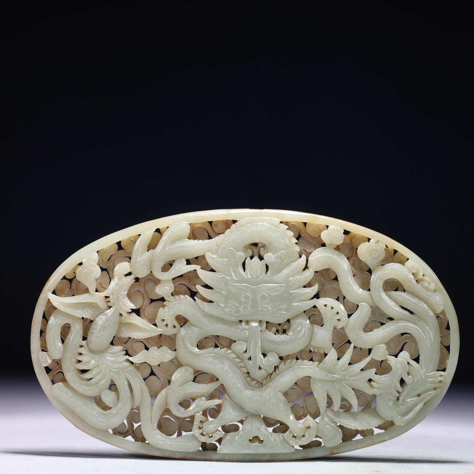 An Exquisite White Jade Dragon and Phoenix Pattern Pendant: An Exquisite White Jade Dragon and Phoenix Pattern Pendant,Qing Dynasty,China,Size:8.1inx4.7in,Weight:405.4g 白玉龙凤纹佩,中国清代