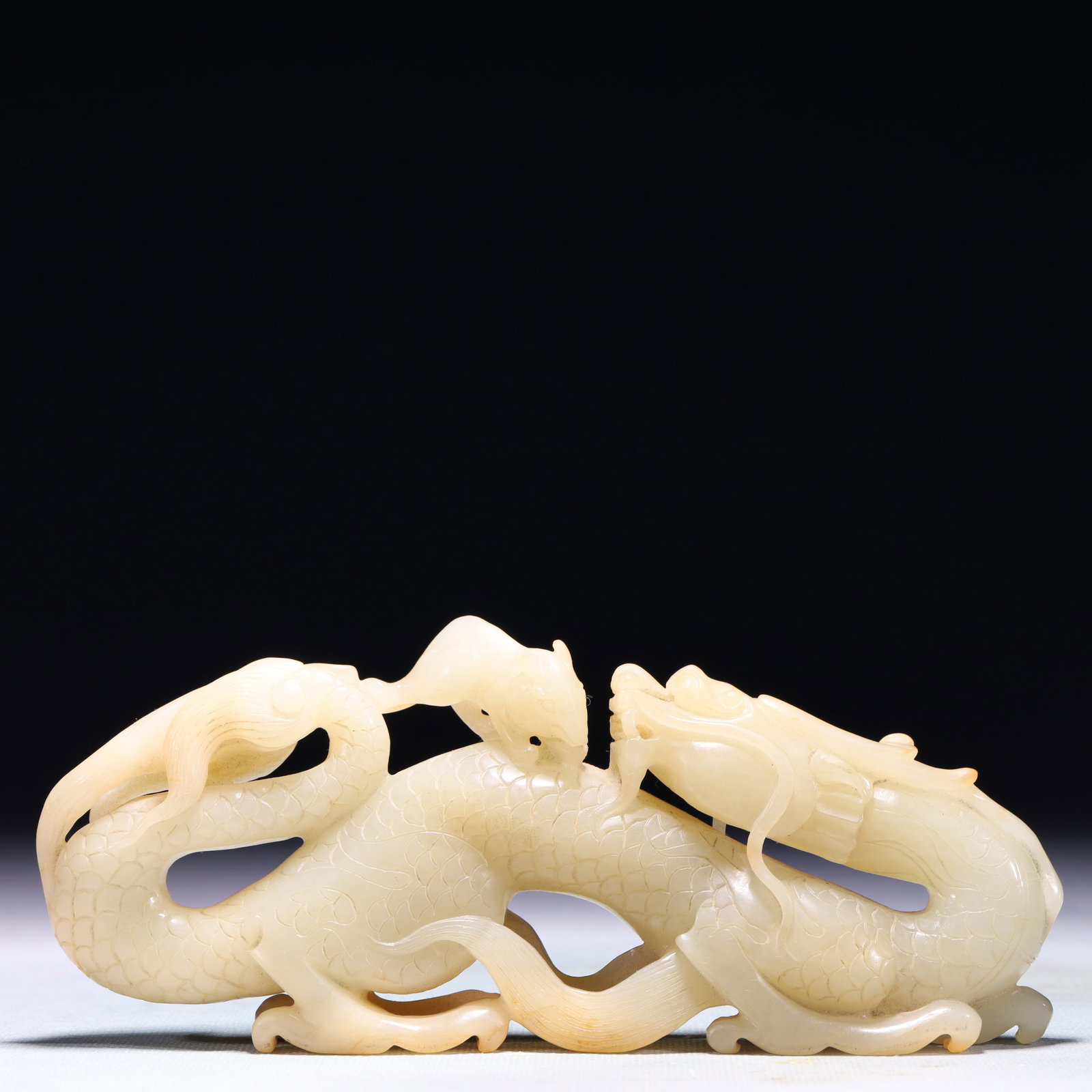 An Exquisite White Jade Dragon Ornament