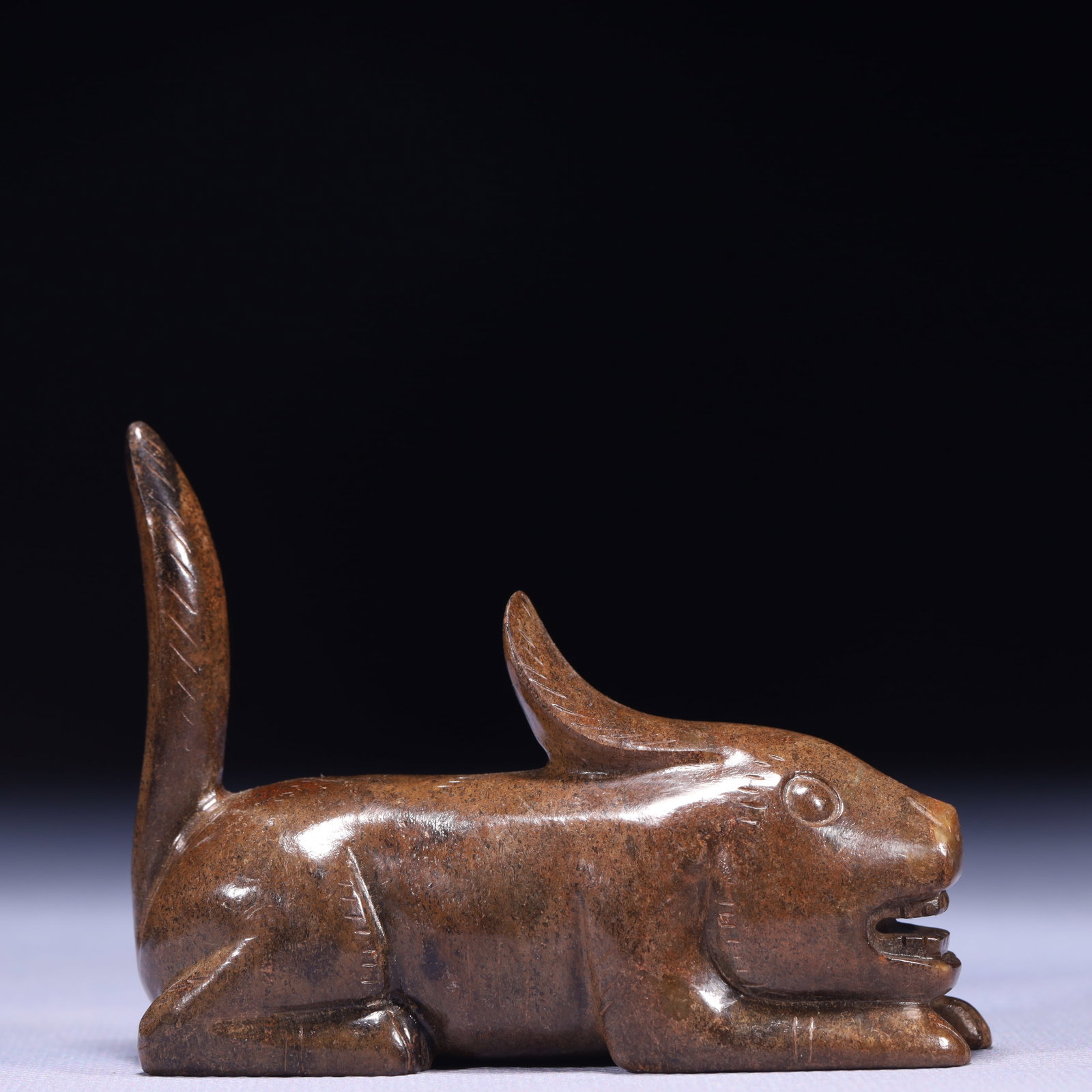An Exquisite Archaic Jade Beast Ornament: An Exquisite Archaic Jade Beast Ornament,Ancient Time,China,Size:3.5inx1.2inx3in,Weight:227g 高古玉兽摆件,中国远古时期