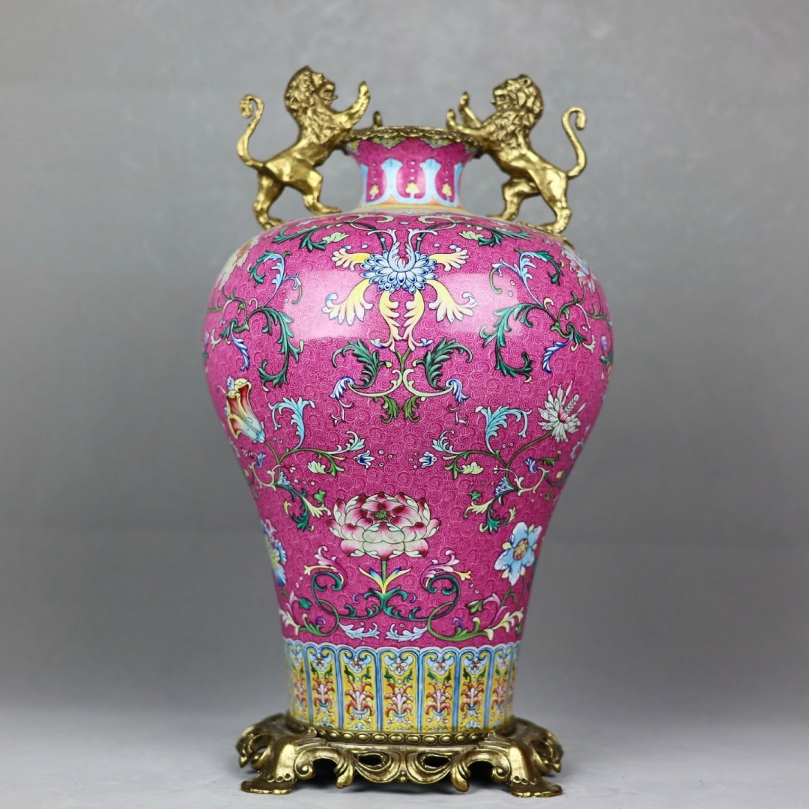A Huge Famille-Rose Inlaid Bronze Lotus Pattern Lion-Ears Vase: A Huge Famille-Rose Inlaid Bronze Lotus Pattern Lion-Ears Vase,Qing Dynasty,China,Qianlong Four-character Mark,Size:19.3inx9.8in 粉彩镶铜缠枝莲纹狮