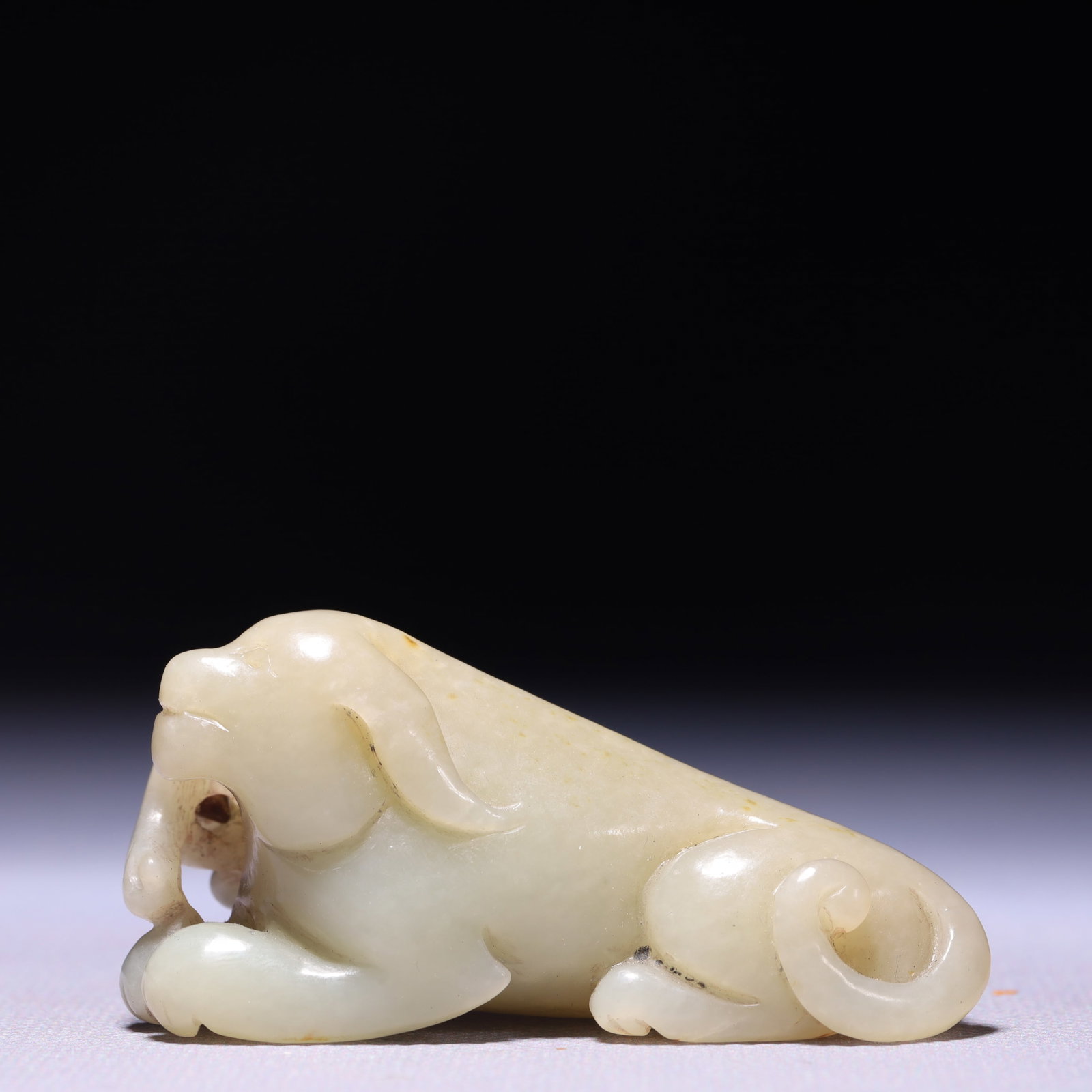 An Exquisite White Jade Dog Ornament: An Exquisite White Jade Dog Ornament,Qing Dynasty,China,Size:2.8inx1inx1.2in,Weight:74g 白玉犬摆件,中国清代