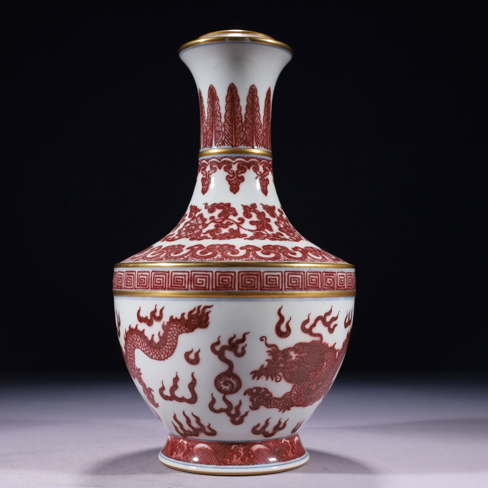 An Exquisite Red Glazed Painted Gold Lotus and Dragon Pattern Vase: An Exquisite Red Glazed Painted Gold Lotus and Dragon Pattern Vase,Qing Dynasty,China,Qianlong Six-character Mark,Size:6.3inx11.8in,Weight:1500g