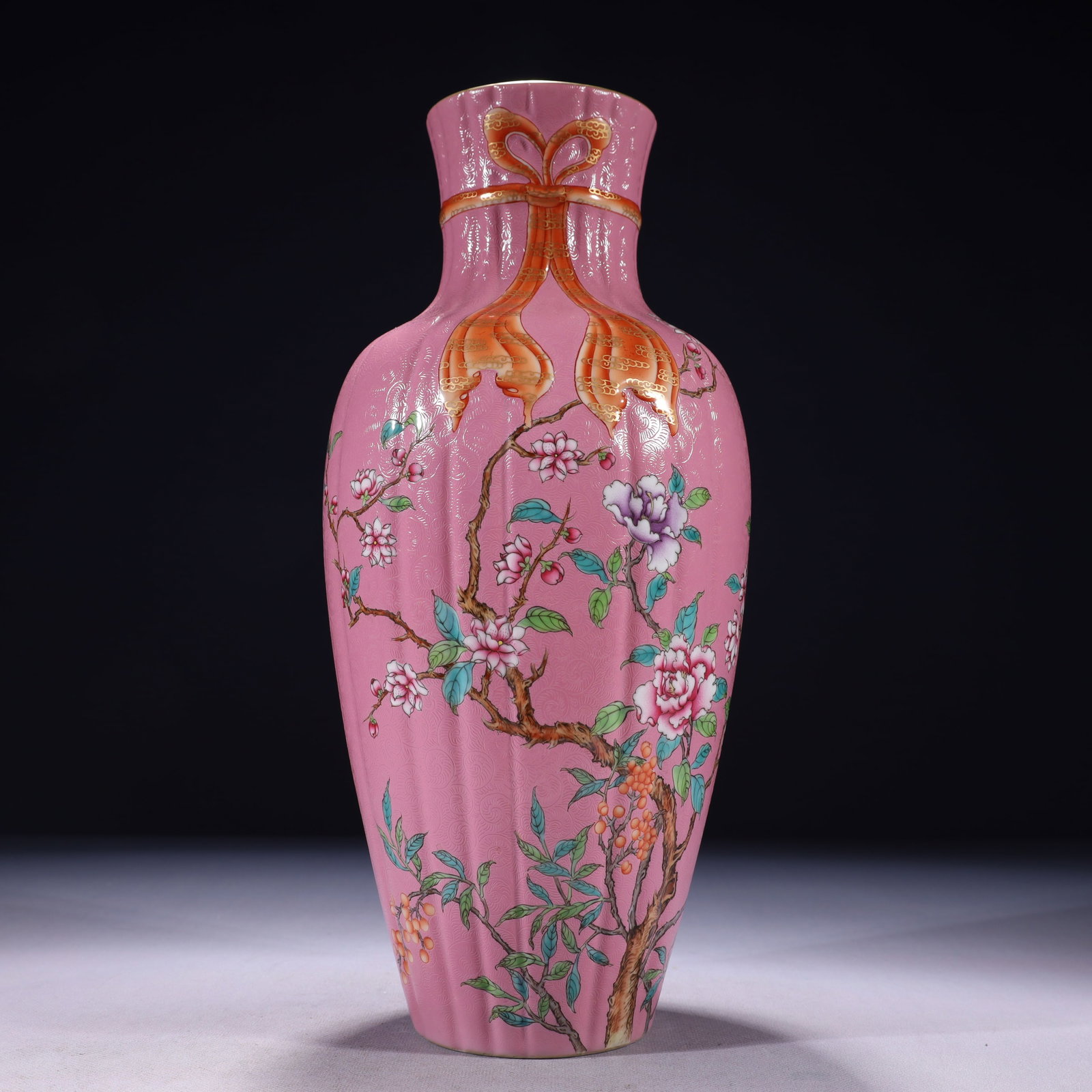 An Exquisite Pink Ground Famille-Rose Painted Gold Flower Pattern Vase: An Exquisite Pink Ground Famille-Rose Painted Gold Flower Pattern Vase,Qing Dynasty,China,Qianlong Six-character Mark,Size:5.5inx13.8in,Weight:1900g 粉地粉彩描金