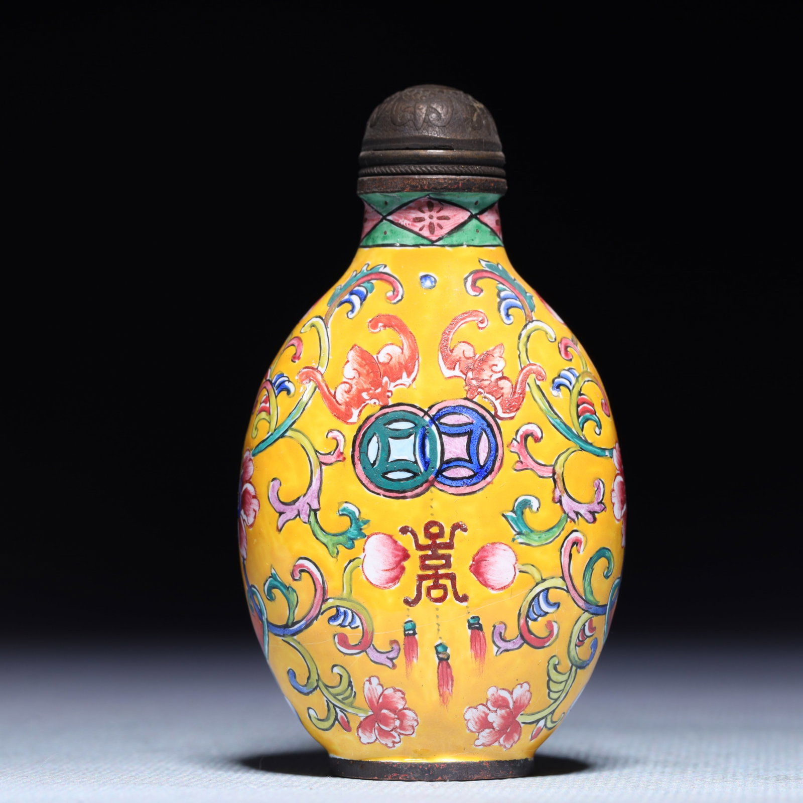 An Exquisite Painted Enamel Bats and Peach Pattern Snuff Bottle: An Exquisite Painted Enamel Bats and Peach Pattern Snuff Bottle,Qing Dynasty,China,Qianlong Four-character Mark,Size:2inx0.8inx3.1in,Weight:62g