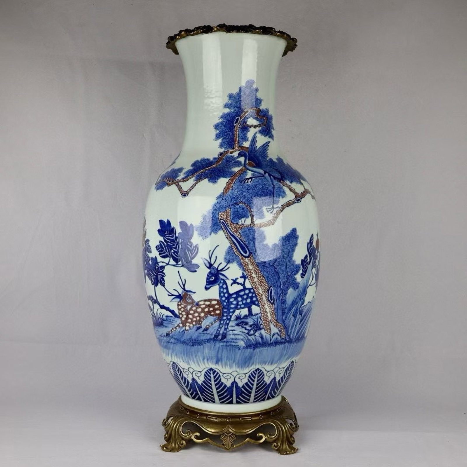 A Huge Blue and White Underglaze-Red Inlaid Bronze Pine and Deer Pattern Vase: A Huge Blue and White Underglaze-Red Inlaid Bronze Pine and Deer Pattern Vase,Qing Dynasty,China,Size:26.8inx11.8in 青花釉里红镶铜松鹿纹
