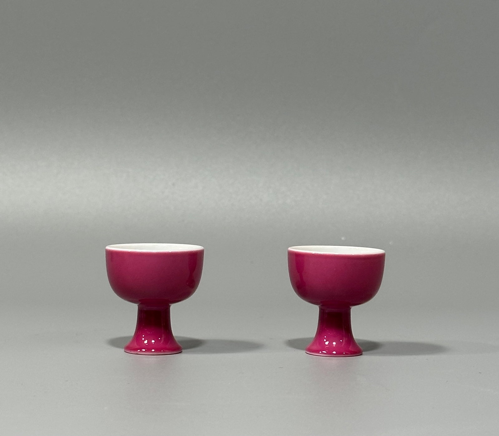 A Pair of Exquisite Ruby Red-Glazed Stem Cups: A Pair of Exquisite Ruby Red-Glazed Stem Cups,Qing Dynasty,China,Yongzheng Six-character Mark,Size:1.2inx1.1in 一对胭脂红高足杯,中国清