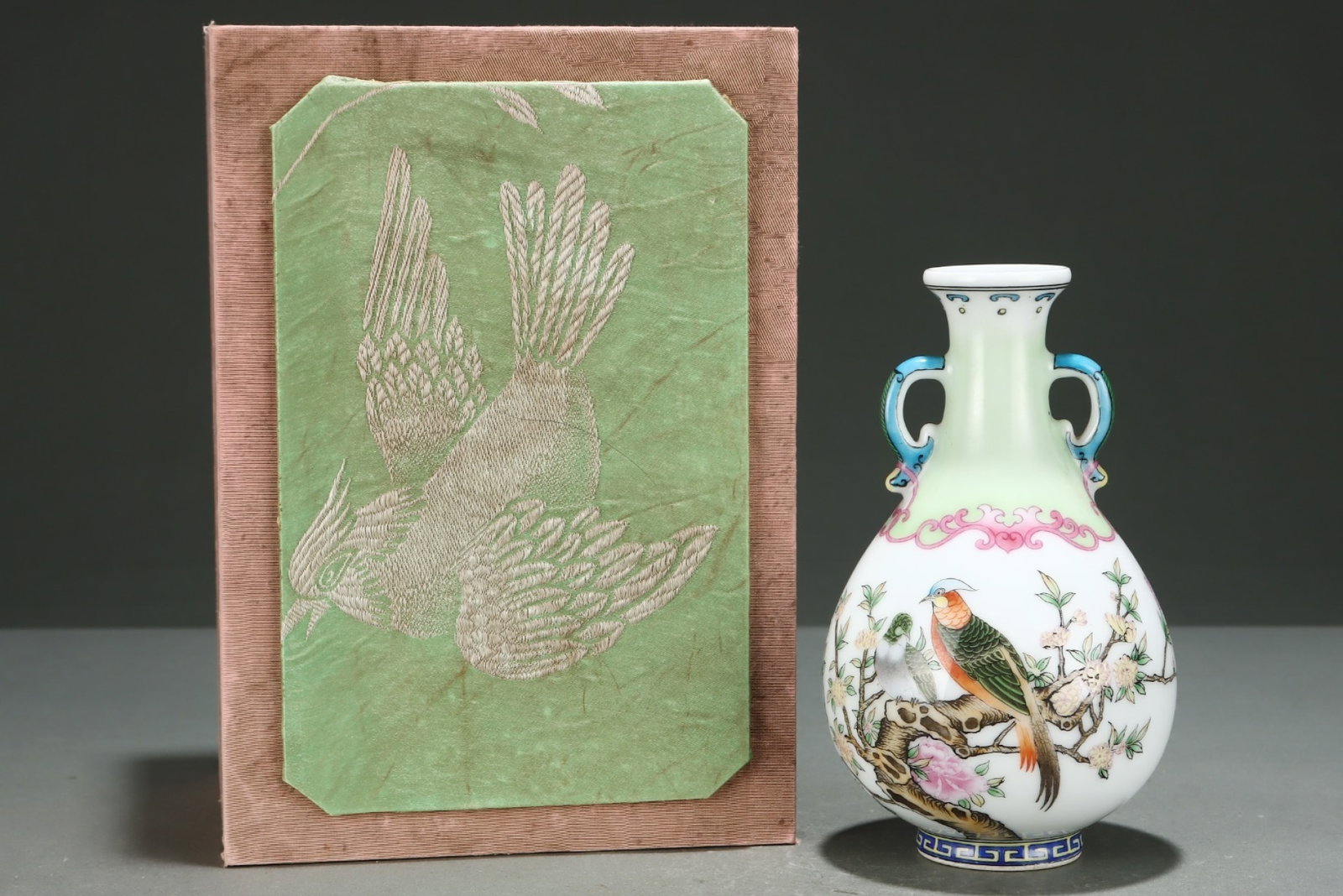 An Exquisite Famille-Rose Flower and Bird Pattern Double-Ears Vase,with poem: An Exquisite Famille-Rose Flower and Bird Pattern Double-Ears Vase,with poem,Qing Dynasty,China,Qianlong Four-character Mark,Size:6.4inx3.9in 粉彩花鸟纹双耳&#