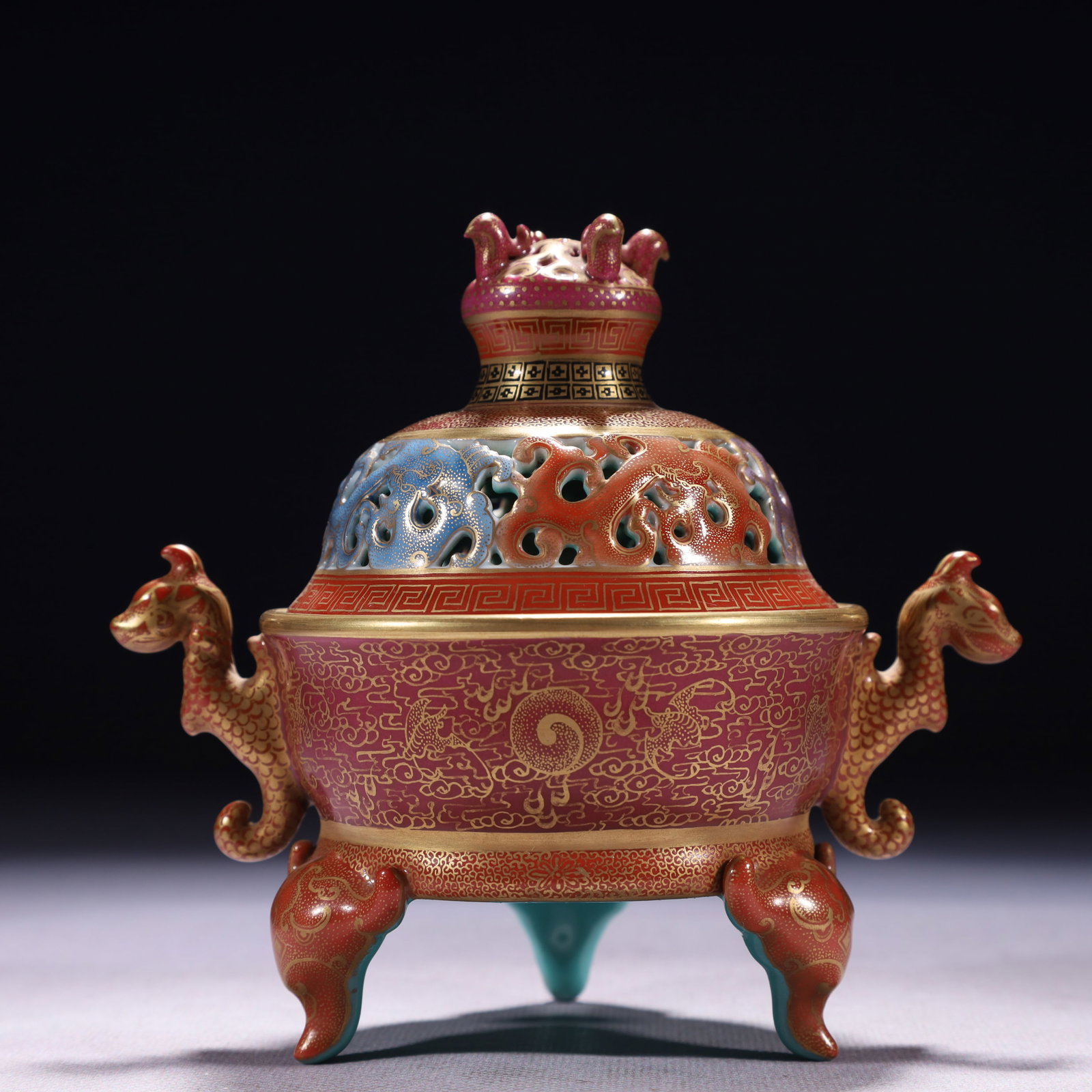 An Exquisite Red Glazed Painted Gold Auspicious Cloud and Bats Pattern Double-Ears and Tripod Censer: An Exquisite Red Glazed Painted Gold Auspicious Cloud and Bats Pattern Double-Ears and Tripod Censer,Qing Dynasty,China,Qianlong Four-character Mark,Size:5.1inx5.5in,Weight:300g 红釉৻