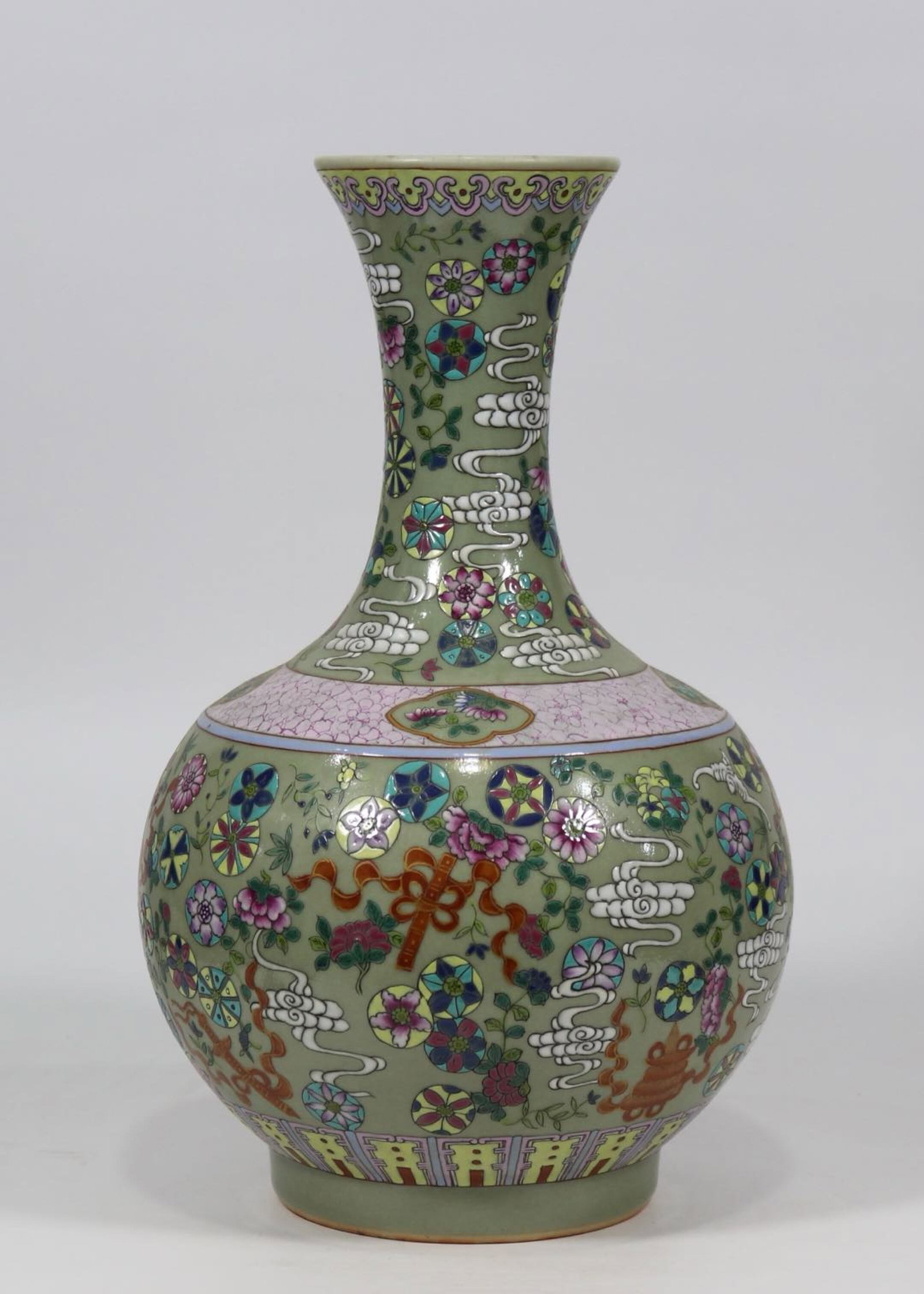 A Huge Celadon Glazed Famille-Rose Eight Treasures Pattern Vase: A Huge Celadon Glazed Famille-Rose Eight Treasures Pattern Vase,Qing Dynasty,China,Qianlong Six-character Mark,Size:15.9inx8.9in